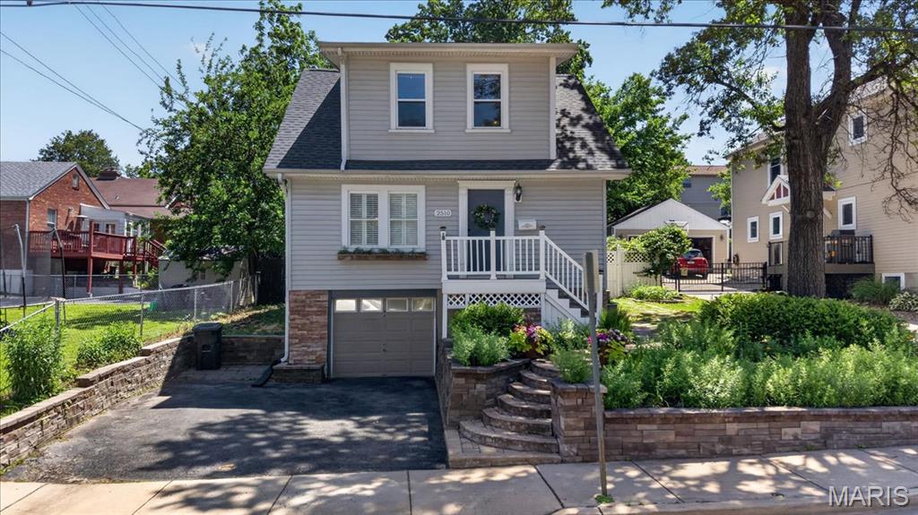 Open House Saturday, 5/16 from 12-2PM! Don’t miss this charming home in the heart of Maplewood. Step inside to find beautiful floors flowing throughout the main level, leading you through a bright, open living space with Bluetooth-controlled lighting. The separate dining area is perfect for entertaining, while the kitchen features stylish two-tone custom cabinetry and updated appliances. A convenient half bath completes the main level. French doors open to a fully fenced, level backyard with a fire pit area, perfect for hosting friends or enjoying quiet evenings outdoors. Upstairs, you’ll find two generously sized bedrooms, offering flexibility for your ideal primary setup, along with an updated full bathroom. The lower level offers additional storage space along with a tuck-under garage. Additional updates include a brand new roof (2024), a storage shed, and new composite wood outdoor steps. Tuck-under garage with Tesla charger plus two parking spaces. Located just steps from the library, public pool, local coffee shops, restaurants, and all the best amenities Maplewood has to offer!