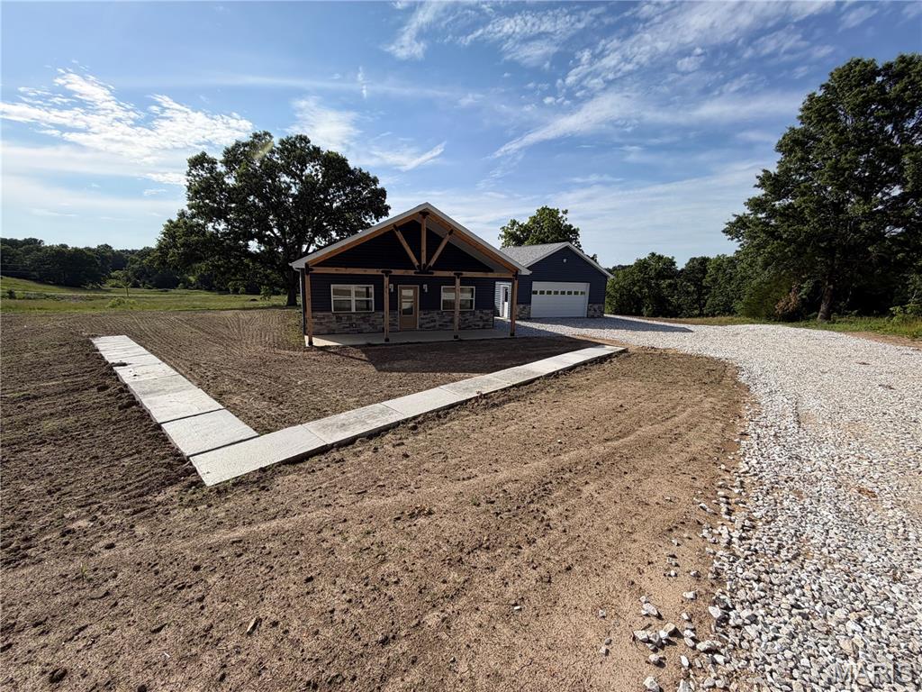 Escape to peaceful country living with this new construction on 7 acres just 15 minutes from Moberly!

This charming new construction home sits on 7 acres featuring 3 bedrooms, 2 bathrooms, and a detached garage. Offering the ideal blend of privacy and functionality, this property offers an open concept, along with a modern kitchen with all new electric appliances. The backyard is ideal for entertaining, gardening, pets, or simply relaxing and taking in the scenic surroundings. The 7 acres offers endless possibilities, that provides the quiet lifestyle you've been searching for while still being conveniently located near modern amenities. A rare chance to own acreage with comfort, space, and versatility.