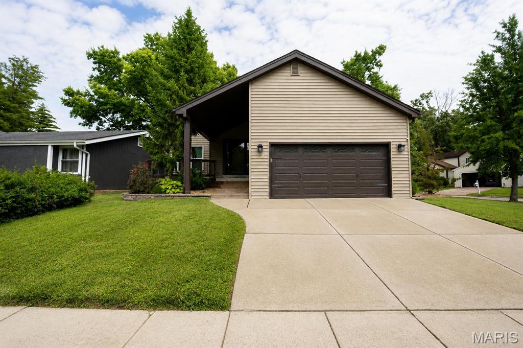 Welcome to this beautifully updated 3-bedroom, 2-bath mid-century home nestled in unincorporated St. Louis County, just minutes from Creve Coeur and Maryland Heights. Thoughtfully renovated throughout, this move-in ready home blends timeless character with modern updates for today's lifestyle.

The updated kitchen (2025) showcases stylish finishes and a fresh, contemporary feel, while the primary bath was renovated in 2021 to create a comfortable retreat. One of the home's standout features is the balcony loft overlooking the main living area, flooded with natural light and offering the perfect space for a home office, reading nook, or flex living area. Downstairs, the walkout basement provides a spacious bonus entertainment area ideal for gatherings, game nights, or additional living space.

Major mechanical and exterior improvements provide peace of mind, including a new roof (2022), water heater (2024), AC (2021), deck (2021), and updated windows, siding, and doors (2021). The furnace was replaced in 2016.

With its inviting layout, extensive updates, versatile living spaces, and prime location near shopping, dining, parks, and major commuter routes, this meticulously maintained home is ready for its next owner. Simply move in and enjoy. Buyer or buyer's agent to verify all MLS info.