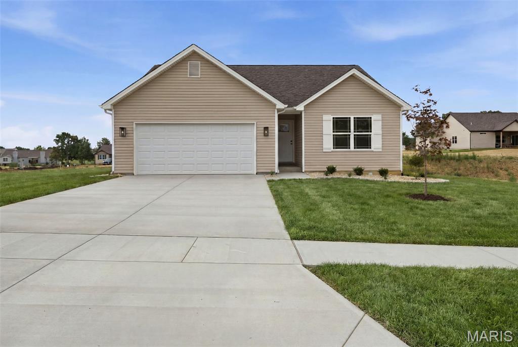New Construction by MH Thornton Homes in Westwood Farms, one of Warrenton's most desirable new home communities! Featuring quality craftsmanship, designer finishes, and an open-concept floor plan, this beautiful ranch home offers modern comfort and exceptional value.
The attractive low-maintenance exterior boasts outstanding curb appeal with durable vinyl siding, architectural shingles, decorative garage coach lights, professional landscaping, and a fully sodded yard.
Inside, the thoughtfully designed split-bedroom floor plan provides privacy and functionality, with the Primary Suite situated separately from the secondary bedrooms. Vaulted ceilings in the main living area create an open, airy feel filled with natural light.
This home features 3 bedrooms, 2 full bathrooms, luxury vinyl plank flooring throughout the main living areas, quartz countertops, GE appliances, main-floor laundry, and an open stairwell leading to the lower level.
The spacious Primary Suite includes a large walk-in closet and a well-appointed bath featuring an adult-height double bowl vanity and quality finishes throughout.
Built with energy efficiency and long-term durability in mind, additional features include Low-E windows, a high-efficiency gas furnace, 50-gallon water heater, Tyvek house wrap, termite pretreatment, Watch Dog foundation waterproofing system, and a garage door opener.
The lookout basement offers exceptional potential for future expansion and features additional windows that flood the space with natural light, creating a bright, open, and spacious atmosphere rarely found in a lower level. With plumbing rough-in for a full bathroom and a sump pit already in place, this versatile space is ready to be transformed into additional living areas, a recreation room, home office, fitness room, or guest suite.
Located in the sought-after Westwood Farms community, residents enjoy convenient access to Interstate 70, Highway 47, shopping, dining, recreation, schools, and everyday amenities.
Built with excellence by MH Thornton Homes, this home showcases exceptional attention to detail and superior craftsmanship throughout. Don't miss this opportunity to own a beautiful new home in one of Warrenton's premier neighborhoods.

Directions from St. Charles County: Take HWY 70 West to the Warrenton Exit (Exit 193). Go north on HWY 47 for about 1/4 mile, then turn right onto McGee Rd. You’ll see the development on your left. Turn left then turn right on Alyson Dr.