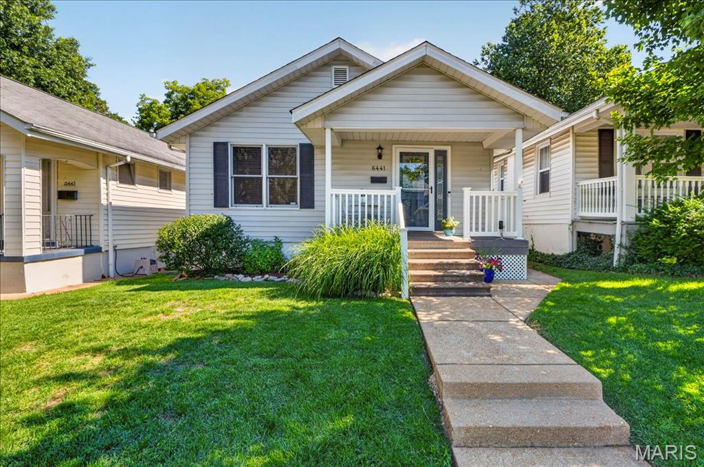 Welcome to 6441 McCune Avenue! Built in 1925, this charming South City bungalow is nestled on a quiet street in the highly desirable Clifton Heights neighborhood. The bright and airy open floor plan features beautiful hardwood floors, neutral decor, and abundant natural light throughout. Two generously sized bedrooms and a full bath complete the main level. The partially finished lower level provides additional living space, including a spacious family/entertainment room, convenient half bath, separate laundry area, and plenty of storage. Washer and dryer are included. Step outside to enjoy the fully fenced, level backyard with a lovely deck, perfect for entertaining, relaxing, or family fun. Shed included. Ideally located within walking distance of Clifton Heights Park and just minutes from shopping, dining, and major highways. New roof in 2025. Don't miss this wonderful opportunity to own a classic South City gem!