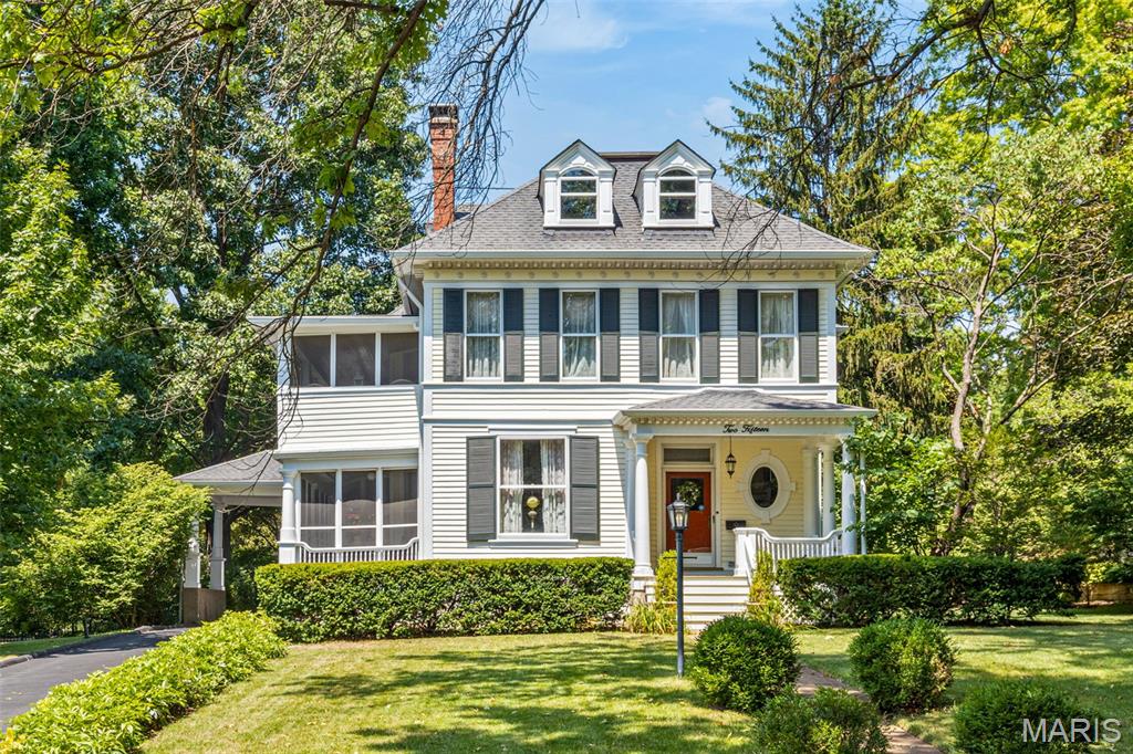 Own a rare piece of Webster Groves history with this gracious 1885 Victorian, perfectly situated in the heart of Webster Park. Rich in architectural detail and historic character, this exceptional property seamlessly blends classic elegance with modern-day comfort.
Inside, you'll find original hardwood floors, intricate millwork, pocket doors, soaring ceilings, and three wood-burning fireplaces that anchor the home with warmth and charm. The main floor offers spacious formal rooms and a cozy side screened porch—ideal for relaxing or entertaining. Upstairs includes generously sized bedrooms and a delightful sleeping porch that provides a peaceful retreat with treetop views.
Step outside to your private backyard oasis, complete with a sparkling pool and mature landscaping. The detached two-car garage/carriage house adds amazing versatility, featuring a large rec room and full bath—perfect for guests, a studio, or home office.
Set on a quiet, tree-lined street in one of Webster’s most coveted neighborhoods, this home is just a short walk to parks, schools, and the charm of Old Webster.
Don’t miss this rare opportunity to own a true historic gem in an unbeatable location!