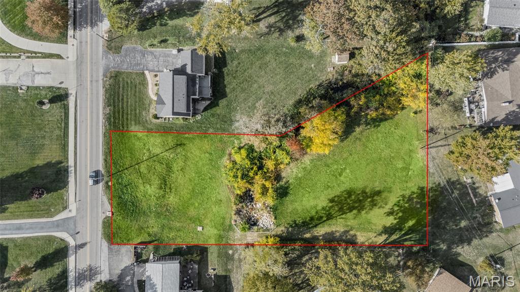 Rare opportunity. 0.87-acre buildable lot in Sunset Hills. The lot is mostly level. The creek on the property can be covered. Build your dream home. Additional Rooms: Other