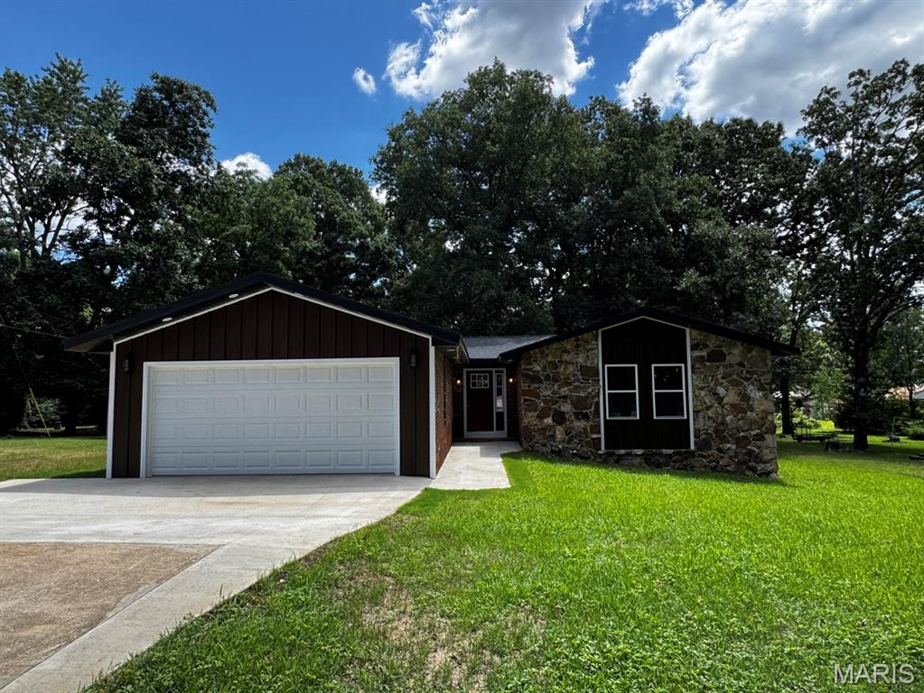 Beautifully remodeled brick home featuring 3 bedrooms and 2 full baths. This move-in-ready property has been extensively updated with a new roof, new plumbing, new electrical, new water heater, and brand new energy-efficient windows. The updated kitchen offers new cabinetry, quartz countertops, and stainless steel appliances. Additional improvements include new interior and exterior doors and a spacious deck overlooking the peaceful backyard. The functional floor plan provides a comfortable living space with modern finishes throughout. Conveniently located and ready for its new owners. Call today to schedule your private showing.