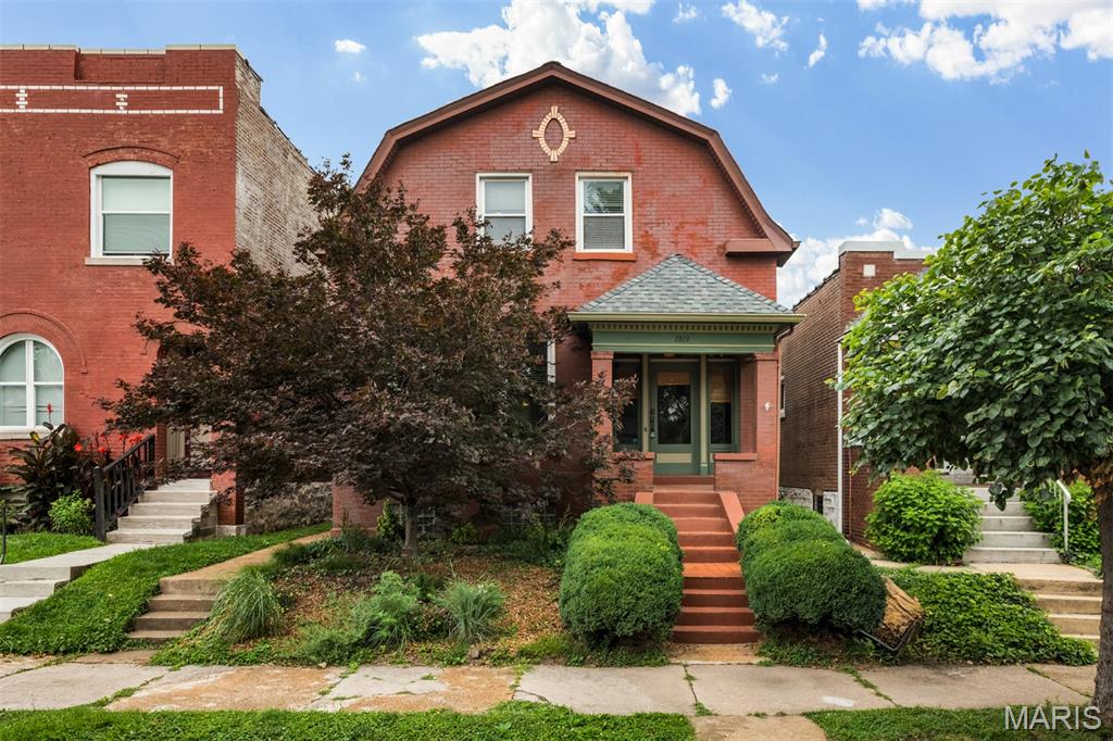 This 1902 brick Dutch Colonial presents timeless elegance, preserved woodwork, and pride of ownership throughout — a classic home with original details and thoughtful upgrades. Inside, original woodwork and gleaming wood floors flow through a graceful circular floorplan anchored by a foyer with a beautiful historic wood staircase and elegant arched doorways. The bright, clean white kitchen and convenient main-floor half bath make everyday living easy. Upstairs, an open landing provides a cozy reading nook. Three generous bedrooms—one with a Jefferson window and private balcony access—share a stunning, spacious full bath that was fully remodeled in 2024. The basement is clean and freshly tuckpointed/painted, providing ample storage and laundry space. Outside, a darling, fully fenced city garden offers privacy and mature plantings, complemented by a 1-car garage, a stamped concrete patio (2023) and pergola, perfect for relaxing or entertaining. Recent improvements include roof (2025), water heater (2025), full bathroom remodel (2024), and tuckpointing (2025) — a rare combination of historic charm and modern reliability.