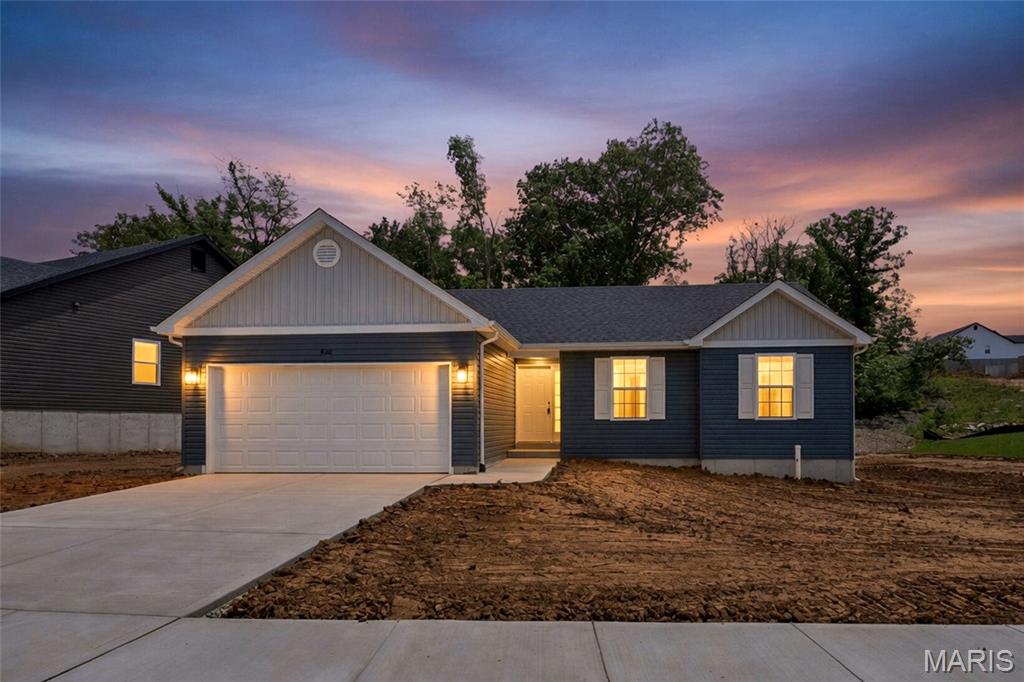 Welcome to this 3 BD, 2 full BA, N/C Ranch home featuring an inviting floor plan perfect for modern living! Upon entering the Great Room, you will notice an open and inviting atmosphere to include the comfort of a woodburning fireplace for those chilly nights! The Kitchen boasts 42" custom cabinetry, stainless steel appliance to prepare those home cooked meals, w/a Center Island that adds more seating for eating! Off the Breakfast, walk out the beautiful sliding doors onto the 12 x 12 patio to enjoy a morning cup of coffee or the beauty of nature.  The Primary Bedroom offers plenty of natural light and a spacious walk-in closet. Nestled in a prime location which consists of an easy commute to schools, daycares, medical, grocery, retail, and work-making your day-to-day life a breeze. This home is a perfect blend of comfort, style, and accessibility, don't miss out. Fully sodded yard to be installed, weather permitting.