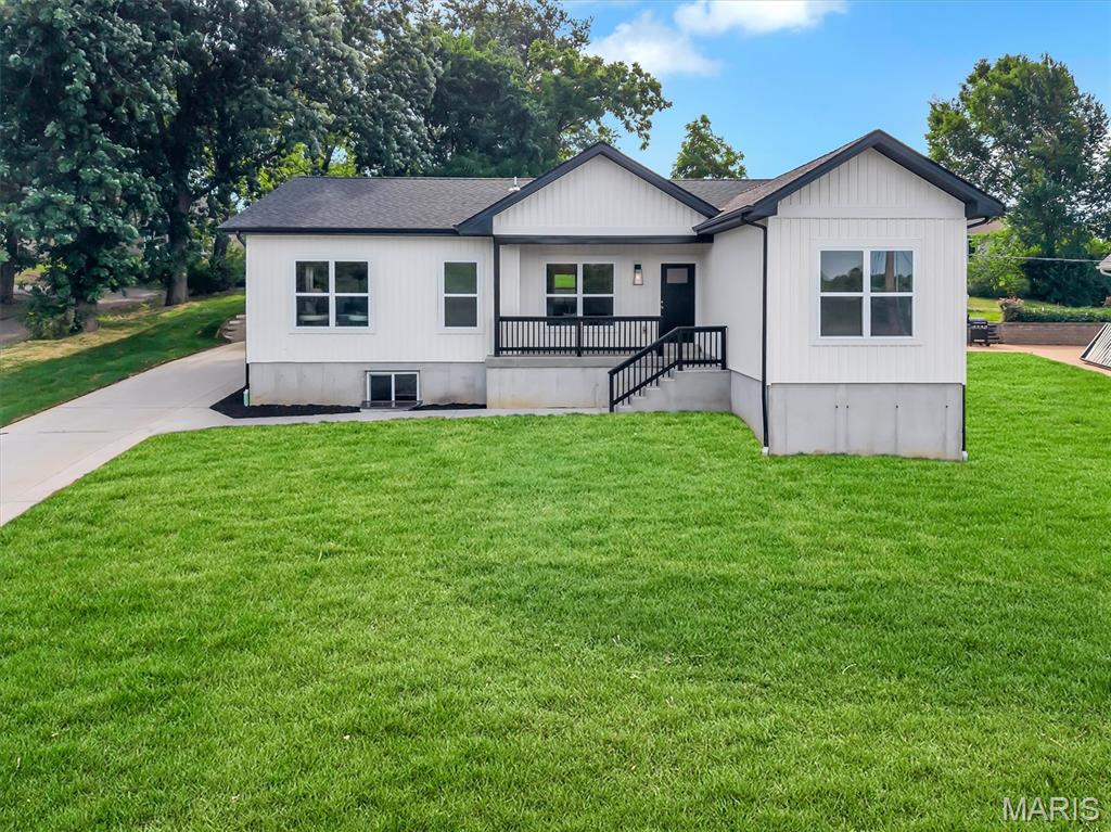 Welcome home to this private Maryland Heights New Construction oasis away from subdivision neighbors! This large lot offers mature trees, a private back yard for entertaining and a scenic view off the front porch. The spacious 3 bed, 2 bath home has a completely open floor plan. High end finishes including wood flooring, custom cabinetry and trim, quartz countertops, and exquisite tile work details the home from top to bottom. An oversized two car pull behind garage provides off street parking and storage with a custom home feel. The full basement with 8' ceilings, a roughed in bathroom and egress window creates an opportunity for nearly 1,500 sq ft of additional living space.   In this neighborhood you are close to Westport, Hwy 40 and 270 and many other amenities. Do not miss out on this stellar opportunity. Owner Agent