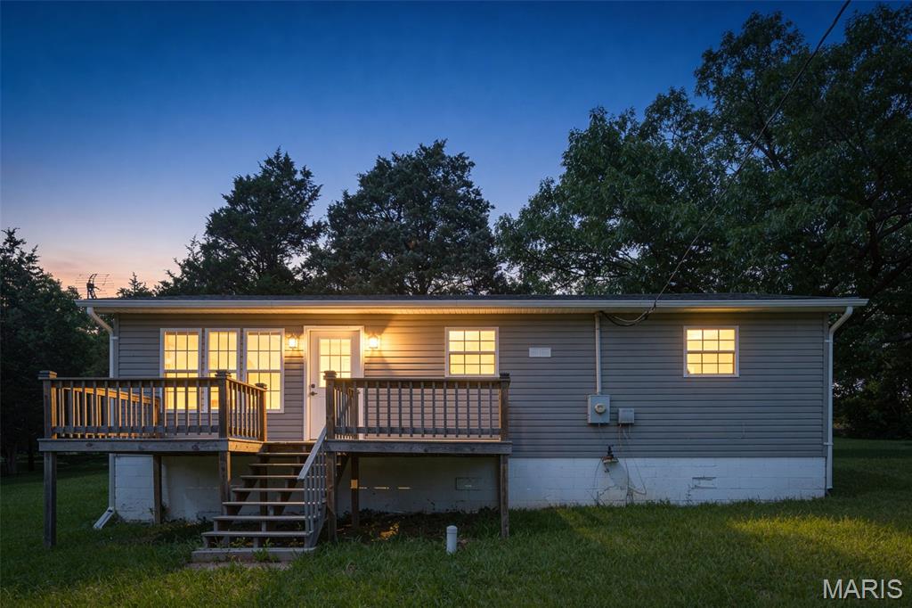 Fully updated 2BR/1BA home located in a desirable Sunrise lake community. Interior features modern finishes throughout, including updated flooring, fixtures, kitchen, and bath. Bright and functional floor plan offers comfortable living and move-in-ready convenience. Detached garage provides additional storage and off-street parking. Located on a large corner lot... enjoy access to lake community amenities and recreational opportunities while being just minutes from everyday conveniences. Ideal as a primary residence, or vacation getaway.. Don't miss this opportunity to own an updated home in a sought-after lake Sunrise Lake.