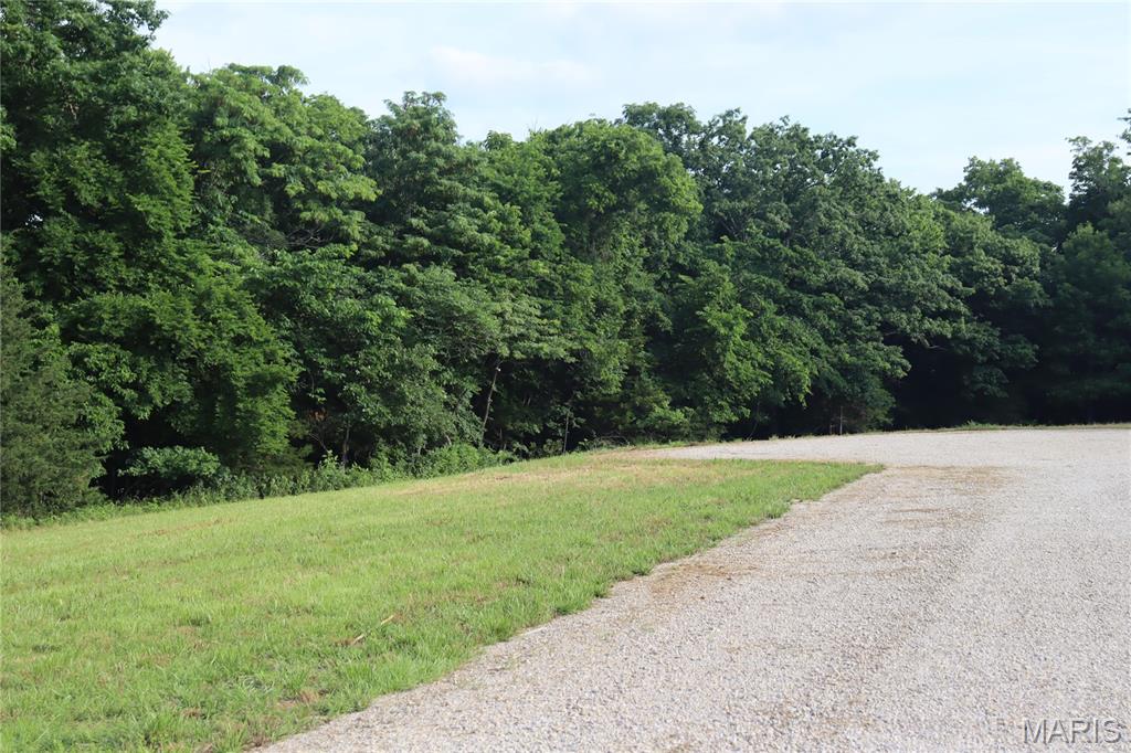 Discover 13.44 acres of pure Missouri beauty in the brand-new Tanglefoot Farms Subdivision. This exceptional lot has amazing street frontage with many building site options and adjoins Joachim Creek. It offers a stunning hilltop home site overlooking a peaceful valley—an ideal setting for your dream build. With abundant deer and turkey, it’s a paradise for anyone who loves the outdoors.

It is located in the Festus School District and there is shopping, dining, and everyday conveniences nearby. You’ll enjoy the perfect blend of countryside serenity and accessibility. Metro St. Louis is less than an hour away, making this an unbeatable location for commuters or weekend travelers.

This is truly one of the nicest lots in the area—builder-ready, scenic, and packed with potential. Opportunities like this don’t come around often. Experience the tranquility for yourself and schedule your showing today.
