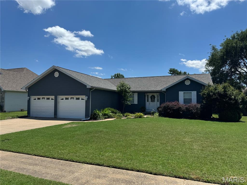 Don't wait to see this great family home with amazing curb appeal, located on a low-traffic circle drive on the south end of Sikeston.  It features three large bedrooms and two bathrooms, an open kitchen and dining room and central living room, all in 1,701 square feet of living area.   The front foyer leads to the living room and out to the rear deck and privacy fenced back yard.  The 145 square  foot storage shed with an overhead door sits in a corner of the back yard and has its own patio.  

The vinyl siding, floor coverings, and privacy fenced were replaced in 2017 and the roof was replaced in 2018.  Bathrooms were remodeled in 2024 and 2026.