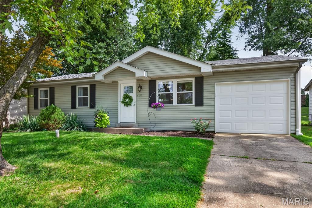 Looking for a charming home that offers both privacy and convenience? this beautifully maintained property is a must-see. Nestled in the desirable Charles Village community, it enjoys a comfortable setting while remaining close to shopping, dining, and everyday amenities. Inside, luxury vinyl flooring flows throughout the main level, creating a clean, modern feel. The welcoming family room offers a warm, relaxed atmosphere and opens seamlessly to the kitchen, featuring an oversized sink, rich dark cabinetry, stainless steel appliances—including a gas range, microwave, dishwasher, and large refrigerator, all included in the sale—and contemporary lighting that completes the space. The updated bathroom adds a fresh, stylish touch, while the spacious primary bedroom is complemented by two additional bedrooms that are perfect for family, guests, or a home office. The finished lower level provides even more versatile living space, ideal for a media room, recreation room, or home gym, along with a large bonus sleeping area featuring an oversized closet for additional storage. Grab some drinks and head out to the back paver patio and enjoy the day under some beautiful trees. This move-in-ready home combines comfort, functionality, and an excellent location—making it a wonderful place to call home. Hurry!
