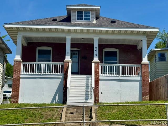 Offering 3 bedrooms 1 bath. There is a large living room and separate dining room that has a built in hutch. The home features, new furnace, fresh paint throughout, New flooring, New drywall ceilings and lighting. The kitchen is Complete with Refrigerator and Stove. Located just off the kitchen is a 3 season porch to enjoy. The bathroom is updated.  The upstairs bedroom features, new drywall fresh paint and hardwood floors.  The exterior has a new Roof and fresh paint, including a large covered porch. There is alley access with 2 parking spaces and a nice backyard. Located in the Mark Twain Elementary school district.