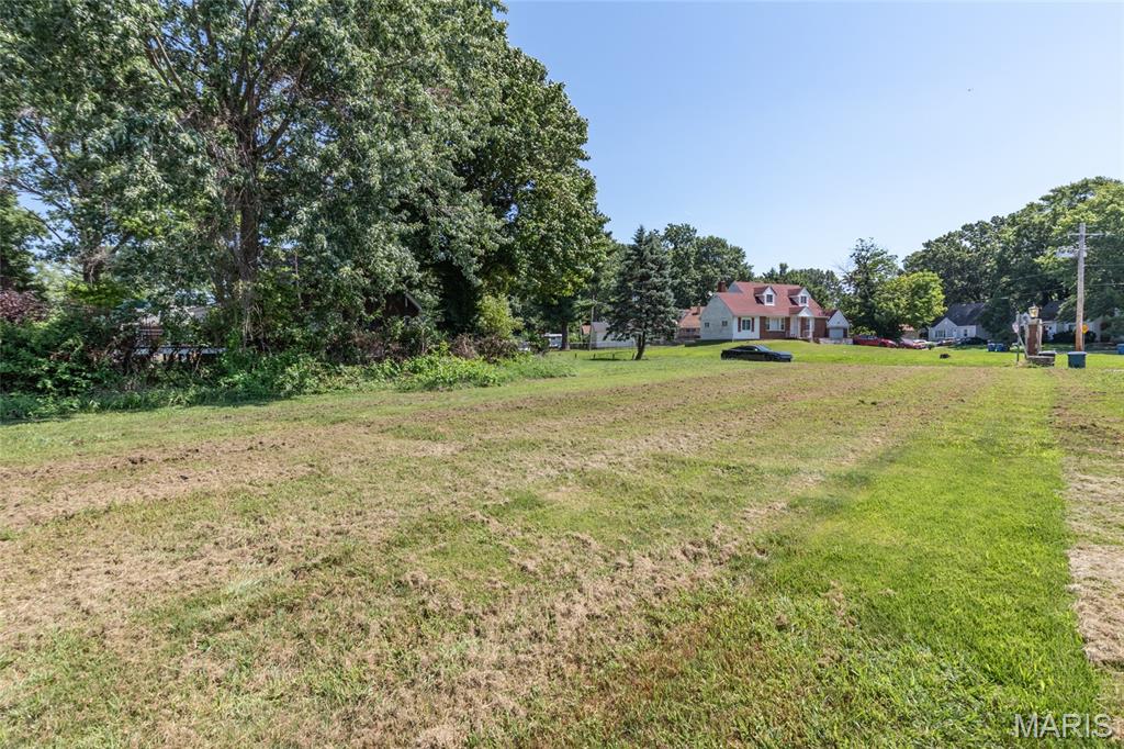 Build Your Dream Home Near Larimore Park & Future St. Louis Zoo WildCare Park. Situated between Larimore Park and the upcoming St. Louis Zoo WildCare Park (opening 2027), this flat residential lot offers both convenience and future value. With electric and water nearby, it’s ready for your building plans. Whether you’re creating your dream home, adding to your investment portfolio, or holding for future appreciation. This lot is for you!