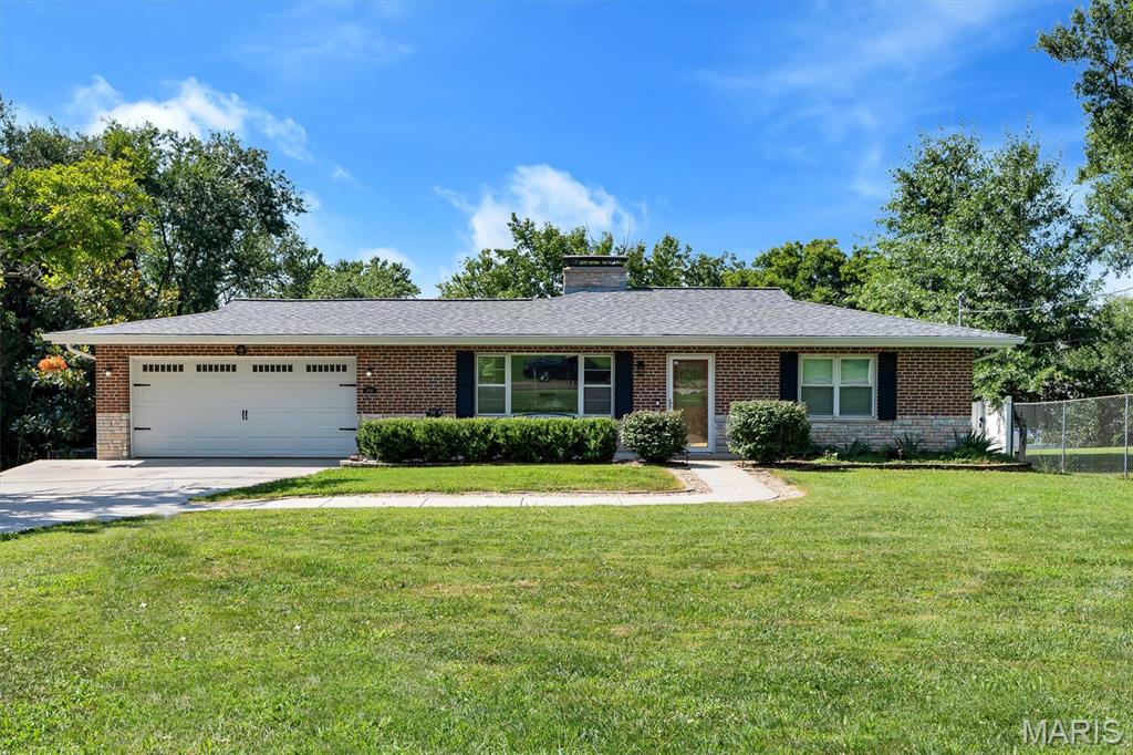 Set on a rare 1.6-acre lot in Oakville, this charming brick ranch offers the perfect blend of privacy, character, and modern comfort. Inside, warm wood floors welcome you into a bright living room with a cozy wood-burning fireplace. The kitchen and breakfast room flow easily together, creating a comfortable everyday layout. Two main-level bedrooms feature deep closets and sit alongside an updated full bath, while the walkout lower level expands your living space with a media/recreation room, fireplace, third bedroom with egress, full bath, and laundry. Enjoy summer days in the in-ground pool and evenings surrounded by the peaceful, oversized lot. With two fireplaces, an attached garage, and thoughtful updates throughout, this Oakville gem is one you won’t want to miss.