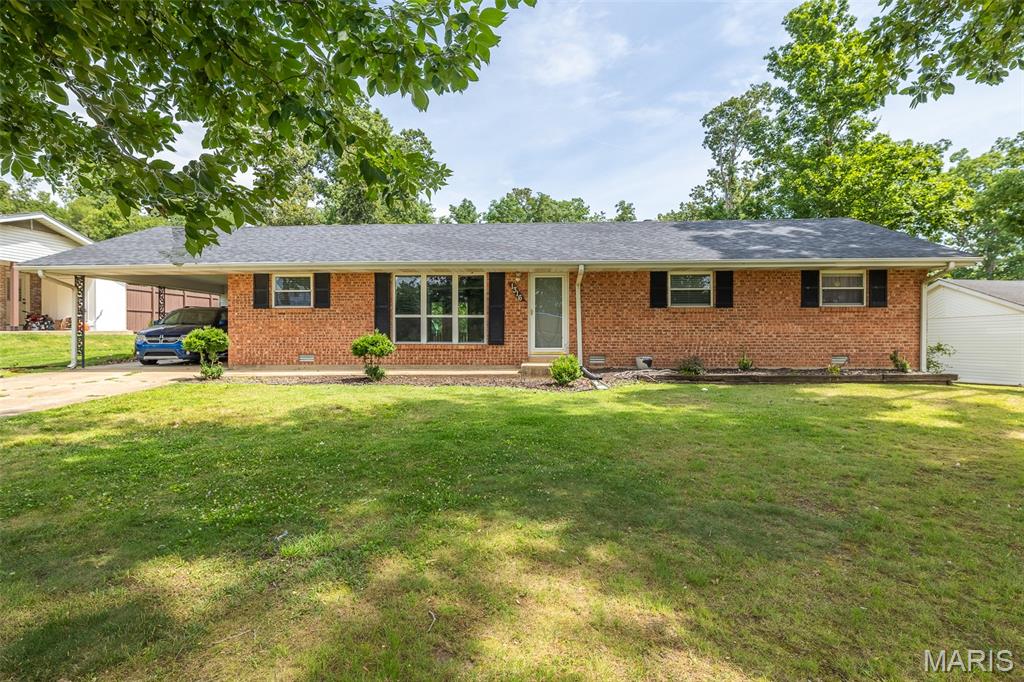 Welcome home to this charming 3-bedroom, 2-bath all-brick residence offering timeless appeal and outstanding curb appeal from the moment you arrive. Inside, you’ll find a comfortable and functional layout perfect for everyday living and entertaining. Step outside and enjoy the spacious covered back porch—an ideal spot for relaxing with your morning coffee, hosting family gatherings, or unwinding after a long day. The backyard provides plenty of space for outdoor activities, while the detached garage located at the rear of the property offers convenient parking, storage, or workshop potential.
With its attractive brick exterior, inviting presence, and desirable outdoor amenities, this home combines comfort, character, and practicality in one beautiful package. Don’t miss your opportunity to make it yours. Call today before gone tomorrow!