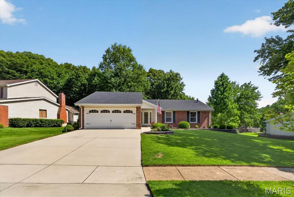 Abundant natural light, soaring vaulted ceilings, and a backdrop of mature trees create an atmosphere that feels both open and serene. Beautifully maintained and extensively updated, this exceptional ranch offers a NEW Roof (2024), NEW Water Heater (2025), renovated Primary Bath (2025), updated Kitchen finishes, and the kind of PRIVATE backyard setting that's becoming increasingly difficult to find.

The vaulted family room immediately draws you in with warm hardwood flooring, a wood-burning fireplace, and an abundance of windows that frame views of the wooded backyard beyond. Filled with natural light and designed for everyday comfort, it's a space that feels both inviting and effortlessly comfortable. 

At the center of the home, the beautifully updated kitchen features white cabinetry, quartz countertops, a farmhouse sink, stainless steel appliances, and a glass tile backsplash that creates a timeless look. What truly sets this space apart is its remarkable connection to the outdoors. A sliding glass door with an additional glass panel, paired with two picture windows above the sink, floods the kitchen with natural light and showcases stunning views of the deck, beautifully manicured backyard, and mature trees beyond. The result is a space where the beauty of the outdoors feels like part of everyday living. The adjoining breakfast room overlooks the backyard, while easy access to the deck makes everyday meals, weekend brunches, and outdoor entertaining feel effortless.

The main level offers three bedrooms and two full baths, including a spacious primary suite with VAULTED ceilings and a beautifully renovated ensuite bath featuring a glass-enclosed shower. Two additional bedrooms and a full hall bath complete the main floor.

The WALKOUT lower level is easily one of the home's standout features. Designed for entertaining, relaxing, and everyday living, this incredible space offers a large and cozy family room, impressive custom bar area, fourth bedroom, half bath, dedicated home office nook, and abundant storage. Recent updates including newer carpet, baseboards, and bathroom improvements make the space feel fresh, comfortable, and ready to enjoy from day one. Whether hosting game day, movie nights, holiday gatherings, or overnight guests, this level provides the flexibility and room today's buyers are searching for.

Outside, meticulously maintained landscaping creates exceptional curb appeal from the moment you arrive. The expansive deck overlooks mature trees and a beautifully manicured backyard, while the walkout patio below provides yet another place to relax and enjoy the peaceful surroundings. The PRIVATE, tree-lined setting creates a backyard retreat that feels tucked away from it all while remaining close to everything.

Residents enjoy access to neighborhood amenities, including an INGROUND POOL, TENNIS COURTS, and PLAYGROUND, all within the highly sought-after PARKWAY SOUTH School District.

Additional improvements include professional front landscaping and retaining wall enhancements (2019), updated lighting and ceiling fans (2020), basement carpet, baseboards, and bathroom updates (2020), garage door opener (2022), upstairs carpet (2024), hallway lighting (2024), Autumn Blaze Maple tree (2024), and garage window (2025). The attached two car Garage offers built-in wooden shelving, pegboard organization, recessed lighting, and additional storage space, creating the perfect workspace for projects, hobbies, and organization. From the manicured landscaping to the extensive list of updates, pride of ownership is evident throughout every corner of this exceptional home.