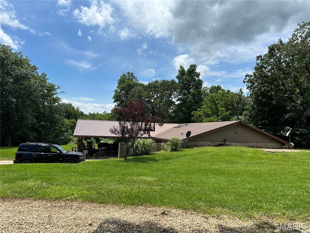Escape to the peace and privacy of the countryside with this spacious, energy-efficient 3-bedroom, 2-bath home nestled on 24.77 picturesque acres. Surrounded by nature, this property offers the perfect setting for those seeking room to roam, gardening, hunting, or simply enjoy the outdoors. Abundant deer, turkey, and other wildlife make this an excellent recreational property, while a peaceful creek meanders along the back edge, adding to its natural beauty and charm. The property also features a 20’ x 30’ workshop complete with electricity, a concrete floor, and a floor drain—ideal for hobbies, equipment storage, woodworking, or your next project. Whether you’re looking for a full-time residence, a hobby farm, or your own private country retreat, this property offers the perfect combination of comfort, functionality, and rural tranquility. Experience quiet country living with plenty of space to enjoy all that nature has to offer, while still being conveniently located within the Gasconade County R-2 School District. there’s always something to be done.