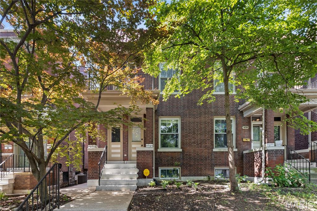 OUTSTANDING OPPORTUNITY! This gorgeous Tower Grove townhome is sure to impress! Thoughtfully decorated & beautifully rehabbed with well over 1800 ft/sq, this home is light and bright with wood floors throughout. This one was a complete gut rehab all the way down to the brick. No worries here with newer everything AND FRESH HIGH-EFFICIENCY HVAC!!! The main level is spacious and open, featuring custom millwork, stunning porcelain detailing in the bathroom, and high end fixtures! The kitchen features a large island with comfortable seating for four, as well as a breakfast area. The upstairs features 3 huge bedrooms, a covered balcony off of the master bedroom, is perfect for relaxing. Outside you'll find a lovely deck and the perfect size yard for a sweet city garden plus off street parking! Home is surrounded by like rehabs and GREAT neighbors all around. Across the street is your 300-acre front yard, Tower Grove Park! Food Truck Friday or the Farmer's Market anyone? Schedule an appointment today!