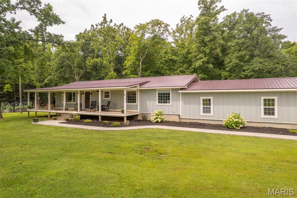 This home underwent a major update in 2019.  The current owner completely gutted it down to the studs.  The home was actually raised 30 inches and set on a new foundation.  Every system to include all plumbing, electrical, HVAC, all fixtures, etc., were replaced.  Walls were moved and an addition was added.  The result shows in the pictures.  This is virtually a new home with 3 large bedrooms, 3 full baths, an open floor concept that is not only appeasing but is very functional.  It has an oversized, attached garage with extra storage areas, a large laundry room and a bonus room that would make a great office space.  The crawl space is encapsulated and has a dehumidifier installed.  The home is on the City of Piedmont water system but also has a whole house "Hydreve" water filtration system.  Sitting on 3.5 manicured acres, it includes some great landscaping, a chicken coop and a vegetable garden which is very impressive.  This wonderful, family home is located on CR 341 (Canyon Road) just across from the golf course and boarders conservation land.  Lon Sanders Canyon is right down the road, Clearwater & Wappapello lakes are near as is the St. Francis and Black rivers, Sam A Baker State Park, Clark Mountain and 1000's of acres of National Forests.  Schedule your appointment for a personal viewing today.