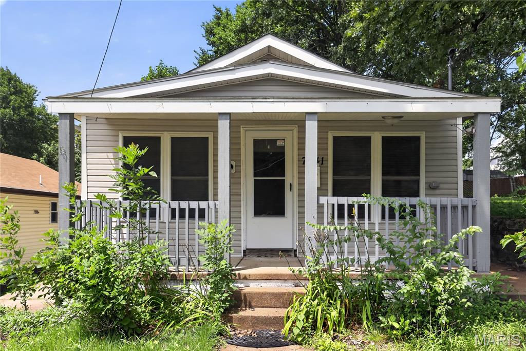 Charming 1925 bungalow in the heart of the desirable Franz Park neighborhood! This cozy 2-bedroom, 1-bath home offers 924 sq. ft. of comfortable living space featuring modern vinyl flooring throughout. The main level boasts a bright, welcoming living room, a functional kitchen, and a separate dining area perfect for quiet meals. Enjoy the convenience of a full basement for extra storage or laundry needs and a relaxing cement patio overlooking your private backyard. Perfectly situated for easy access to city amenities, this well-maintained residence is a fantastic opportunity for comfortable urban living.
