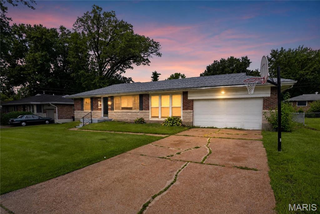 Welcome to 9625 Colony Dr in St. Louis, a well-maintained ranch-style home offering comfortable single-level living with a functional layout. This home features 3 bedrooms and 1 full bath, a bright living room, and an eat-in kitchen with ample cabinet space. The lower level provides additional storage and laundry area with potential for future finishing. Situated on a 0.18-acre lot in the established Bissell Hills subdivision, the property includes an attached garage and a level yard. Conveniently located near schools, shopping, and major highways.