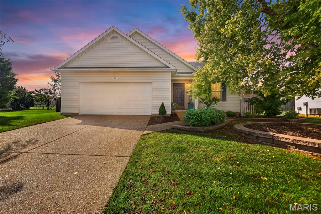 Welcome home to this beautifully maintained, move-in ready ranch tucked away on a quiet cul-de-sac in the highly sought-after Stone Meadows community! The open, vaulted living and dining rooms create a bright, inviting space that's perfect for everyday living and entertaining. The modern updated kitchen features stainless steel appliances (refrigerator included), tile backsplash, under-cabinet lighting, and a breakfast bar between the main living area—ideal for enjoying meals, morning coffee, or conversation.
The spacious primary suite offers a custom closet organization system and a private bath with a corner soaking tub, separate shower, and linen closet. Two additional generously sized bedrooms, a full hall bath, and a convenient main floor laundry room (washer and dryer included) complete the main level.
The unfinished lower level provides endless possibilities for future living space while offering excellent storage with built-in shelving and a utility sink. Additional upgrades include a reverse osmosis water system and a NEW roof (June 2026).
Step outside to one of the home's standout features—a large, level, fully fenced backyard designed for relaxing and entertaining. Enjoy the oversized patio with a gazebo offering shade, privacy, built-in lighting, and a ceiling fan, all surrounded by beautiful landscaping.
Stone Meadows is known for its outstanding amenities, including two pools (one with zero-entry and a lazy river plus a separate lap pool), two stocked lakes, scenic walking trails, soccer fields, a baseball diamond, and beautifully maintained common grounds. Located in the desirable Wentzville (Timberland) School District with quick access to I-70, Highway 40/61, and Highway 364, you're also just minutes from Wentzville Parkway and The Shoppes at Hawk Ridge for shopping, dining, fitness, entertainment, and everyday conveniences. From the inviting backyard to the outstanding neighborhood amenities, this home truly offers the complete package in an ideal location. Schedule your private showing today!