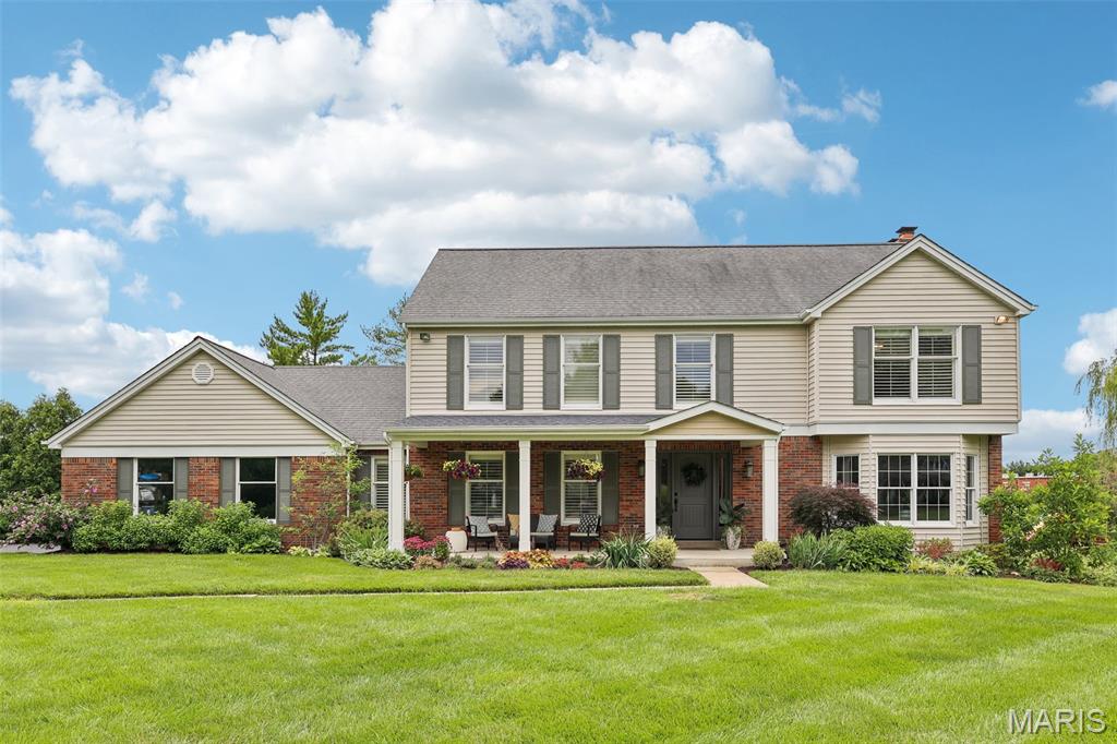 Beautiful updates and exceptional living await you in this Chesterfield, MO home! Located in the desirable Forest Hills Club subdivision in Clarkson Valley, this 4-bedroom, 3.5-bath home offers over 4,100 sq ft of living space on nearly an acre lot. Upon entering, you'll find a versatile living room with bay window that could also serve as an office or playroom, along with a separate dining room. The spacious family room features brand-new bay windows, wood ceiling beams, built-in shelving, and a gas fireplace. The beautifully updated kitchen showcases marble and quartz countertops, a large center island with gas range, beverage bar with refrigerator, soft-close cabinetry, and is adjacent to the three-season sunroom. The sunroom overlooks the pool and provides access to the deck and gazebo. Upstairs, the spacious primary suite features vaulted ceilings with wood beam, hardwood flooring, custom walk-in closet, and private bath with double sink vanity, jetted tub, and separate shower. Three additional bedrooms and a full bath complete the upper level. The finished lower level offers all new LVP flooring, a large rec room with wet bar and refrigerator, beautifully updated full bath, and recently converted gas fireplace. Outside, enjoy your private backyard retreat with an in-ground pool featuring a new liner and heater (2025) and new pool cover (2026). Around the pool you can relax in the gazebo or under the covered patio. Additional updates include fresh paint throughout much of the home, main-floor laundry with custom cabinetry, and a side-entry garage. Located in the highly sought-after Marquette area, this home offers the perfect combination of luxury, comfort, and convenience.