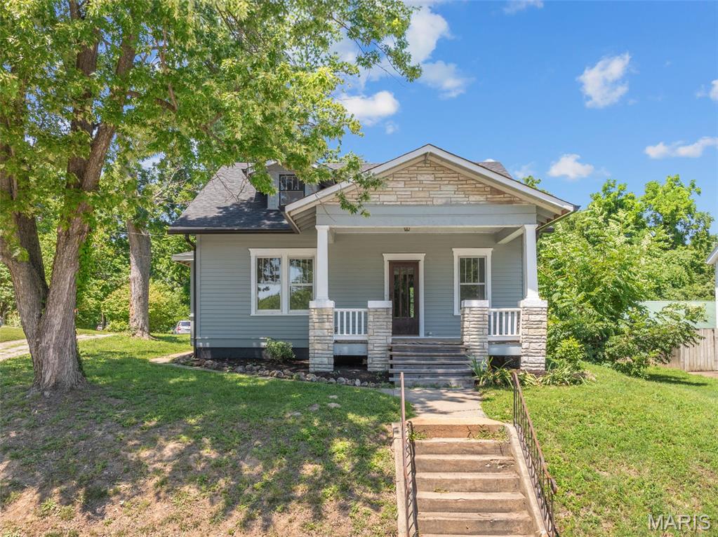 Built with 1940's quality, this Craftsman style with lots of original character will be making its debut soon!  Inside the living room you'll notice the glassed French doors leading to nice big dining room with boxed bay window.  Period millwork throughout.  The eat-in kitchen comes with walk-in pantry.  Bedrooms are housed on the upper level for privacy.  Full, walk-up basement, detached, 2-car garage with concrete floor.  Located close to shopping and Hwy 100 for easy commuting.