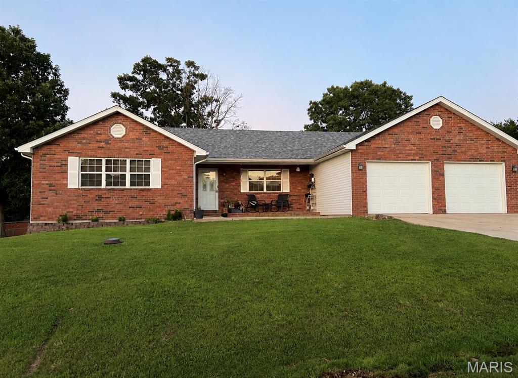 Fresh, comfortable, and close to everything that makes daily life easier in the Fort Leonard Wood area. This updated 3-bedroom, 2-bath Waynesville ranch offers a bright open layout, vaulted living room ceiling, updated kitchen and bathrooms, and fresh paint throughout for a clean, move-in ready feel. The kitchen flows easily into the dining and living areas, creating a natural gathering space for quiet nights at home or easy entertaining. The primary suite includes a private bath with double vanity, while two additional bedrooms offer flexible space for guests, work, hobbies, or everyday life. Outside, the deck and fenced backyard give you room to relax, grill, and enjoy your own outdoor space. Add in a 2-car attached garage, ,quick access to I-44, shopping, schools, and the west gate of Fort Leonard Wood, and this home delivers the comfort, convenience, and fresh-start feeling buyers are looking for. Schedule your showing today.