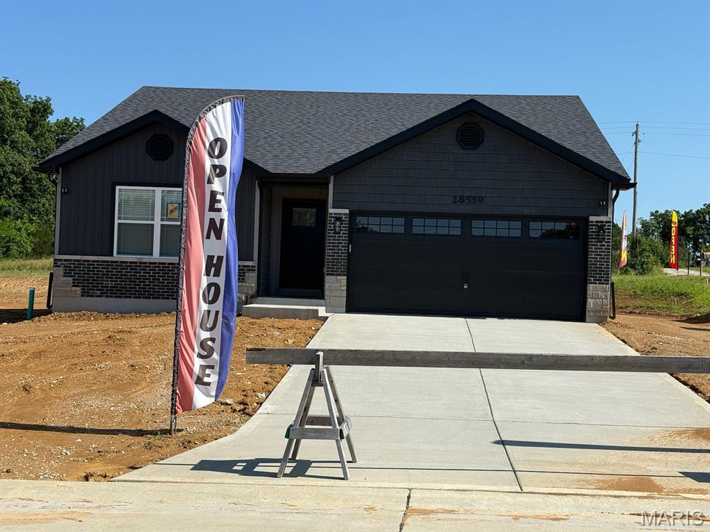 BRAND NEW home with every option you could imagine! They include vaulted ceilings, rounded “bullnose” corners, granite or quartz countertops, stainless steel appliances, 42" cabinets with "cushion close", custom neutral-colored paint job throughout, LVT flooring throughout most of the home, framed windows, taller baseboards, adult-sized cabinets in bathrooms with marble countertops, walk-in closets, upgraded carriage garage doors with openers on 2 CAR Garage, full bath rough-in, panel doors (many varieties), and upgraded water/light fixtures throughout the house! MAIN FLOOR laundry! Fully sodded yard (front/sides/back). *Pictures are of previously built homes. Builder/Broker* This home is USDA eligible.