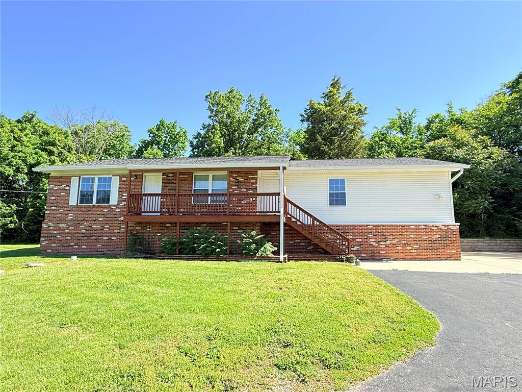 Welcome to this beautifully updated 4-bedroom, 2-bath home in the heart of Fenton, offering 1,675 sq ft of comfortable living space designed for both everyday living and entertaining. Step inside to find a spacious layout featuring a generously sized kitchen and dining area, along with a separate family room that provides additional space for gathering and everyday relaxation. The primary bedroom serves as a private retreat, complete with its own full bath for added comfort and convenience. Enjoy peace of mind with extensive updates completed within the last 9 years, including the roof, siding, flooring, HVAC systems, and water heater. The updated kitchen is a standout, showcasing 42” cabinetry, island, granite countertops, and a stylish tiled backsplash—perfectly blending functionality with modern design. Car enthusiasts, hobbyists, or those in need of extra storage will appreciate the oversized garage, featuring an impressive 8’ garage door—ideal for larger vehicles or workshop space. Situated on a generous .45-acre lot, this property offers ample outdoor space for entertaining, gardening, or simply enjoying the privacy and room to roam. Move-in ready and thoughtfully updated throughout, this Fenton gem checks all the boxes. Schedule your private showing today! A licensed agent has an indirect interest. Tenant occupied. Will need a 24-hour notice for showings.