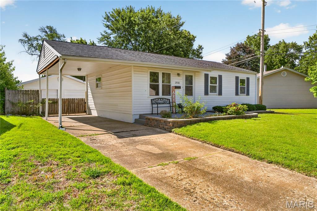 Welcome home to 2530 Grants Parkway in Florissant, where thoughtful updates and timeless charm come together in an exceptional location within the Hazelwood School District. Situated on a quiet, tree-lined street, this beautifully updated home is move-in ready and waiting for its next owner.
Step inside to discover refinished hardwood floors that add warmth and character throughout the main living areas. The completely updated kitchen features brand-new flooring, cabinets and countertops creating a fresh and inviting space for everyday living and entertaining. The home also offers a luxurious full hallway bathroom, beautifully designed with stylish finishes, along with a private half bathroom in the primary suite, providing added comfort and convenience.
Need extra room to spread out? The finished lower level, complete with new carpet, offers valuable additional living space perfect for a family room, recreation area, home office, or workout space.
Outside, you'll appreciate the fenced backyard, ideal for pets, play, or summer gatherings, as well as the oversized two-car detached garage that would be great for a mechanic or workshop  providing plenty of room for vehicles, storage, and hobbies.
Homes with this level of updating and care don't come along often. Schedule your private showing today and see everything 2530 Grants Parkway has to offer before it's gone!