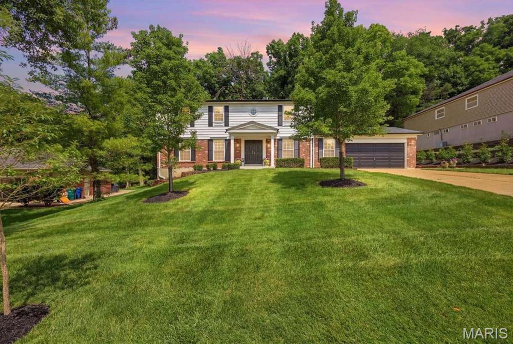 Beautifully updated and meticulously maintained. This one-owner, 
5-bedroom Colonial in the highly sought-after Royal Acres subdivision has been lovingly cared for and it shows.

Step inside to find beautiful hardwood flooring throughout the freshly painted main level. 
The completely renovated kitchen features stunning quartz countertops, a large center island, abundant custom cabinetry, a gas range and a charming garden window that fills the space with natural light.

The spacious first-floor laundry room is a standout feature, offering a utility sink, extensive shelving, plenty of storage, and room for a second refrigerator, making it the perfect drop zone for busy households.

A bright den with bay window and sliding glass doors and custom built in bookcases flank the fireplace.

The first floor also features:
* Updated powder room
* Elegant 6-inch baseboards
* Beautiful crown molding throughout

Upstairs, the beautiful hardwood floors continue through the hallway, primary bedroom, and large walk-in closet. The luxurious primary bath features marble flooring, a double vanity with marble countertop, and a beautifully tiled shower. 
The hall bath is equally impressive with a hexagon marble floor, marble vanity, and updated tub with gorgeous tile. 

All four secondary bedrooms are generously sized, freshly painted, and feature brand-new carpeting.

Outside, you’ll enjoy the beautifully landscaped grounds and a private wooded backyard. A true retreat. Relax or entertain on the expansive patio, newly poured in 2023.

All of this located just a 3-minute walk to the wonderful neighborhood pool! 

Additional major updates include, security system, new heating and cooling system (2025), new hot water tank (2025), new windows (2025), and the entire chimney tuckpointed (2026), offering peace of mind for years to come!

 This home offers the perfect combination of classic charm and modern updates. 

Located in the award-winning Parkway School District, including highly regarded Barretts Elementary School.

This is a rare opportunity to own a truly move-in-ready home in one of the area’s most desirable neighborhoods.
This beauty won’t last!