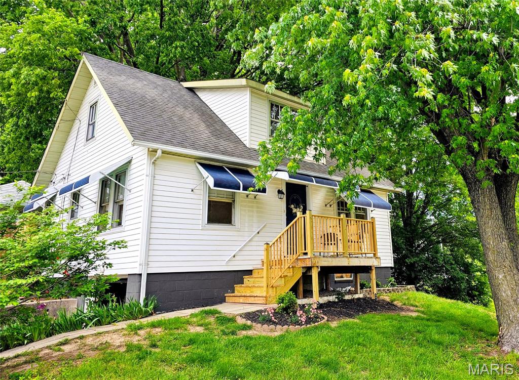 In the heart of the St. Charles historic district, lies this adorable 1.5 story home where timeless character joins everyday comfort to create an inviting atmosphere. From the moment you step inside this charming 4 bedroom, 2 full bath home, you'll be greeted with beautiful wood flooring that adds warmth and elegance throughout the main living spaces. The inviting living room and dining room combo creates an open, flexible layout; perfect for both entertaining and everyday living. Designed with convenience in mind, the home features a main floor primary bedroom, offering easy accessibility and a comfortable retreat. Additional bedrooms upstairs provide plenty of space for family, guests, or a home office. Two updated baths. Step outside and discover even more to love. A large 3 season room offers additional living space and the covered patio is ideal for relaxing and hosting gatherings. The expansive, oversized lot offers endless possibilities for outdoor enjoyment. Those needing extra storage will appreciate the tuck-under garage along with a covered carport with storage shed. The location truly sets this home apart. Just a short walk to the vibrant Main Street in St. Charles, you'll enjoy easy access to boutique shopping, local dining favorites, and year-round entertainment. Whether it's a casual stroll or a night out, everything you love is right at your doorstep.
This is more than just a house, it's a place to call home.