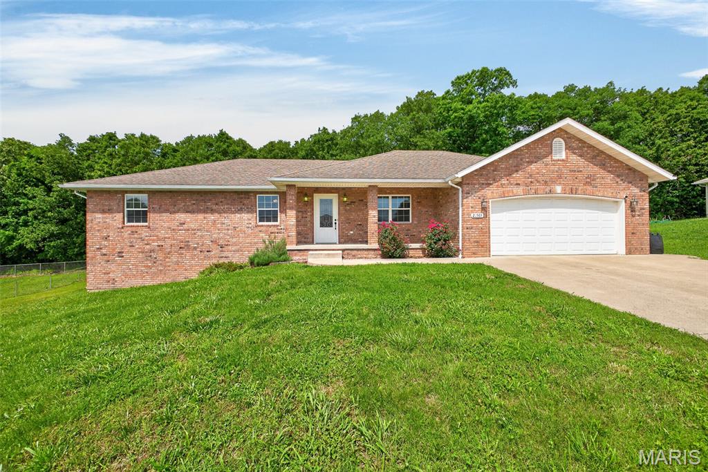 Beautiful 3 bedroom, 2 bathroom ranch style home located in the Northern Heights subdivision!  Walk into the home from your covered front porch to the living room that has vaulted ceiling and carpeted flooring.  The dining room and kitchen have hardwood flooring, ample cabinet/counter space, white appliances and pantry.  Located off the kitchen is the mud room and laundry room.  Washer and dryer are included!  Primary Suite has carpeted flooring, tray ceiling with ceiling fan, walk in closet, and access to the back deck!  Primary bath has ceramic tile flooring, a single vanity and shower/tub insert.  Two additional bedrooms are both carpeted and have ceiling fans.  Other great features include a two car garage and recent rebuilt back deck!  Don't miss this great home at a great price!  Call today to schedule your showing!