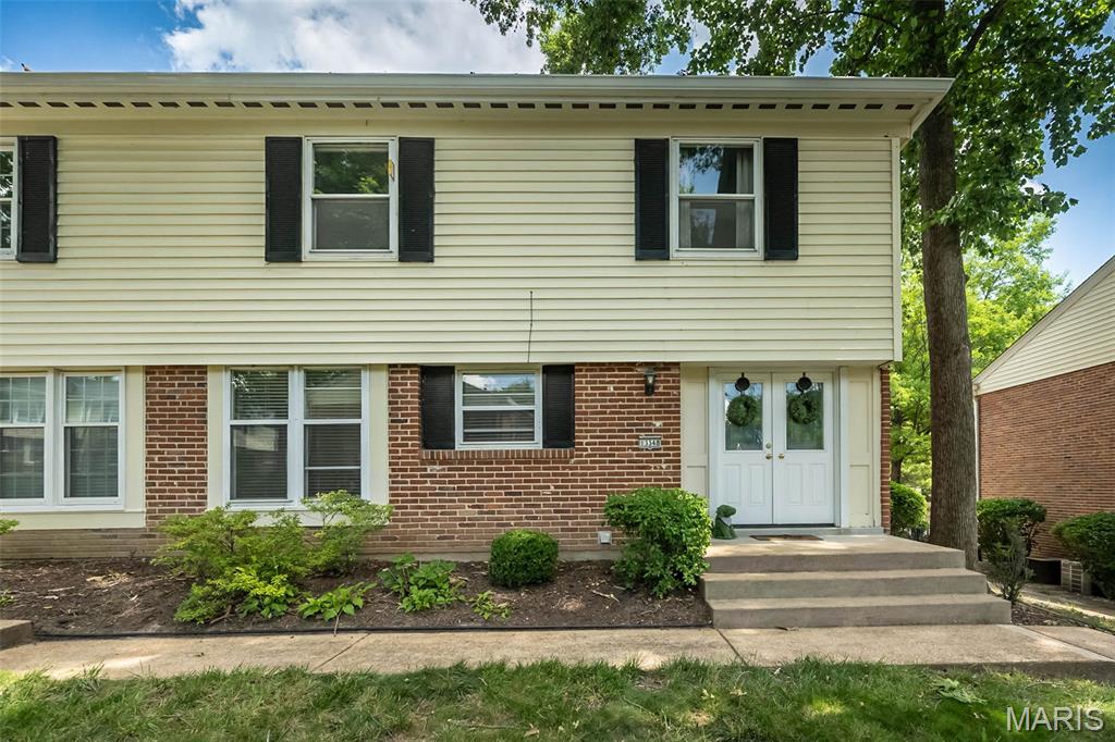 Welcome to this beautifully updated 3-bedroom, 2.5-bath end unit in the highly sought-after Wood Lake community in Parkway West School District! 
This move-in-ready home offers the perfect blend of style, comfort, and low-maintenance living in a convenient location near shopping, dining, entertainment. Plenty of room and storage as this is the largest floor plan in Wood Lake.

Step inside to a beautifully updated spacious family room with additional flex space ideal for a home office, or dining room. Fresh paint throughout, new hardwood flooring on the main level, new carpet upstairs and in the finished lower level, updated lighting, ceiling fans, and new baseboards give the home a fresh, modern feel.
The eat-in kitchen features abundant cabinetry, updated stainless steel appliances, and custom pantry organization. The oversized primary suite offers a beautifully updated ensuite bath, and an additional bedroom closet. The secondary bedroom also includes a walk-in closet, providing exceptional storage.
The finished lower level expands your living space and includes a laundry room with updated flooring and louvered doors.
The Family room offers plenty of natural light through a new glass patio door to your own private outdoor retreat.
 Relax or entertain on the extended patio surrounded by mature landscaping, decorative rock, retaining walls, outdoor lighting, and trees that create a peaceful setting. Plenty of room outdoors to BBQ and entertain guests in your own private area.
Additional updates include new basement windows, an updated main-floor half bath, a newer garage door opener and light.
Ample Parking with 1 garage space and 1 dedicated parking space, and plenty of visitor/extra parking across from the unit.

Enjoy all that Wood Lake has to offer, including a clubhouse, large community pool, tennis courts, playground, lake, and beautifully maintained grounds. This well-appointed home is truly move-in ready and offers exceptional value in a fantastic location. See it before it's gone!