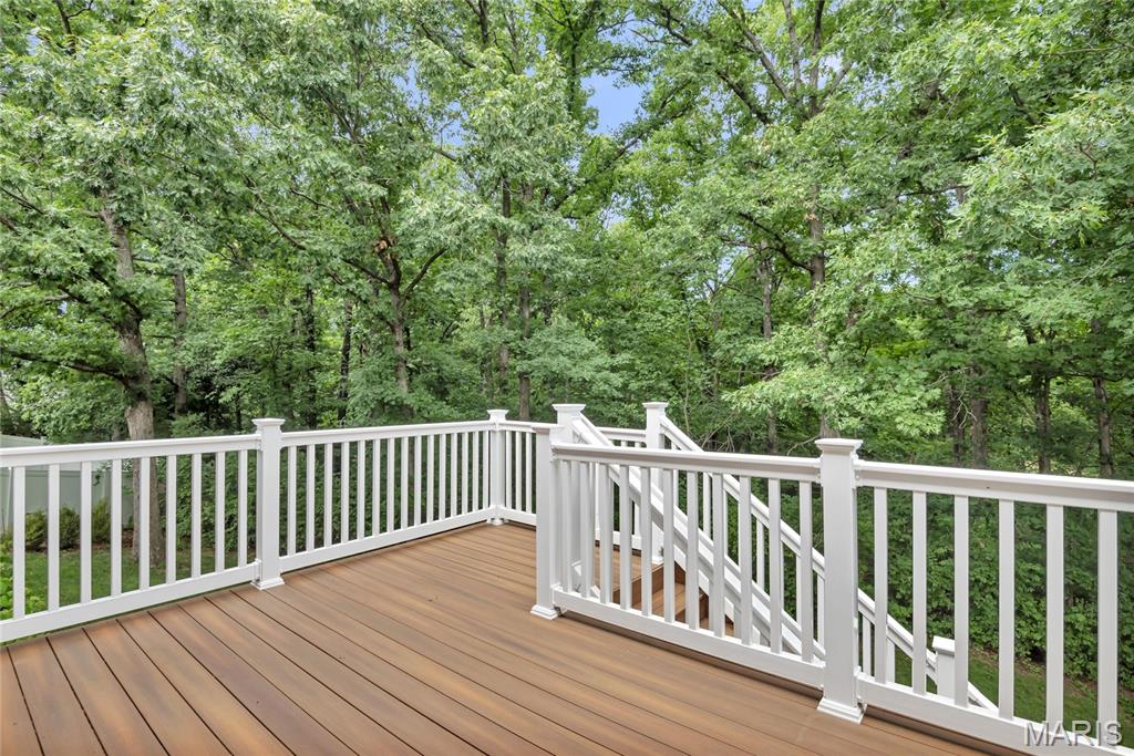 Darling 2-story with private and serene backyard. Cul-de-sac lot with common ground on one side of home separating it from neighbor and backs to trees with Fort Zumwalt Park hidden behind them offering great walking trails right out your back door. The 2 car garage is oversized with a service door that leads to the 3rd car pad on side of home useful for parking a boat, RV, camper or extra car. 
Main level and bathrooms are all updated including LVP flooring, white paneled doors and baseboards, newer windows and trim.
Walk-out your LL with laundry and possible 4th bedroom into the tiered backyard with extensive retaining walls, rock under deck, paver patio and stone steps to the treelined edge of yard. Above ground pools, fencing of all kinds are allowed in here with no active HOA. 
Dining room and large family room with option for breakfast room on main level. Pantry, coat closet, linen closet and walk-in closet along with plenty of storage room in basement. Upper level has 3 bedrooms updated master bath with ceramic tile, attic fan and ceiling fans in all rooms. This home is truly a labor of love and reflects a decade of efforts per seller painstakingly updating.