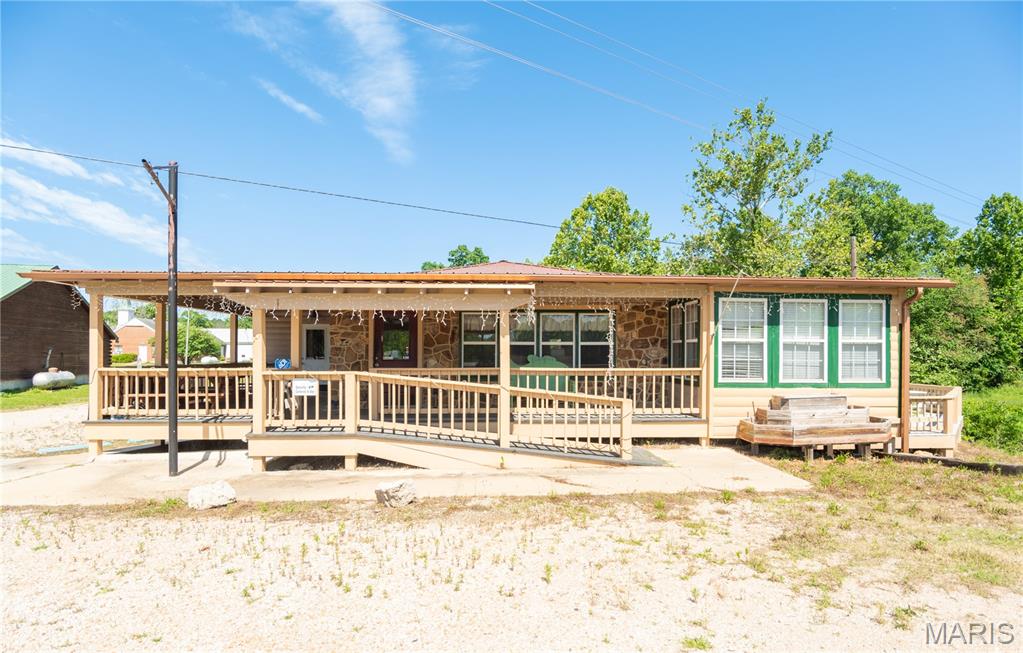 Nestled along 21 highway in the heart of Grandin MO, this property has endless potential for a variety of business ventures. Built in 1932 and freshly remodeled in 2014, this historic building formerly known as the "Lil' Black River Cafe", is a prime location that has been a highly recognized restaurant for the last decade. 
This turn-key property presents a unique chance to continue a restaurant business of your own or make your dreams of starting a new business a reality.  With an ideal highway frontage location and a fully equipped kitchen, interior and exterior, this property is the perfect canvas for your entrepreneurial vision. Located less than a mile from the local bank, Dollar General, city park and gas station, this property sits conveniently amidst all Grandin's amenities. Just 30 minutes or less to Poplar Bluff, Van Buren, and Doniphan. This is truly a piece of Grandin history, contact me to make this river-side investment yours today! Location: City, Corner Location, High Traffic, Hwy/Interstate Frntg