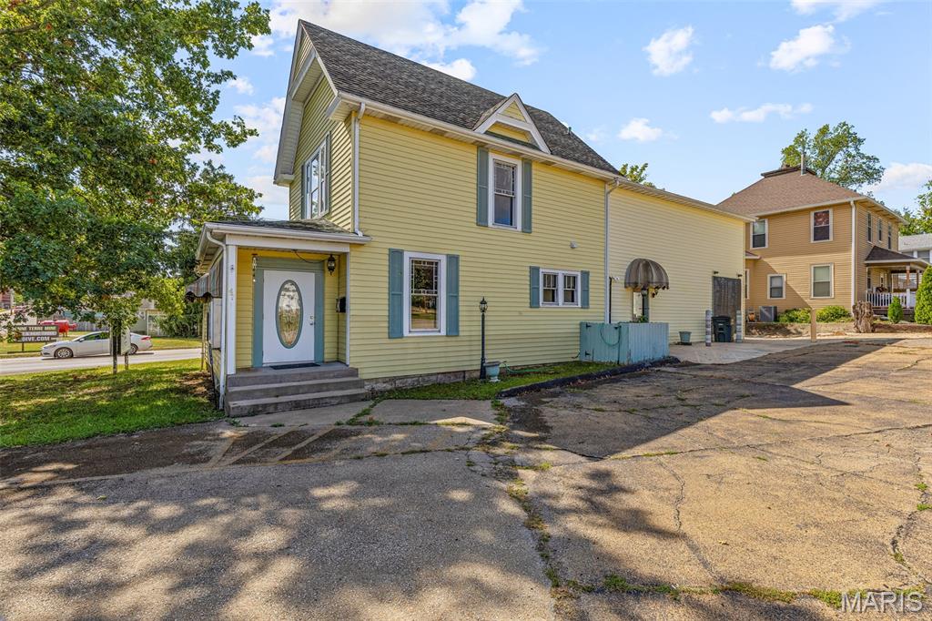 Unlock a unique live/work opportunity in the heart of Bonne Terre! Located at 47 N Allen St, this versatile two-story commercial building offers over 4,000 sq ft of prime real estate. Previously housing a bustling salon, massage studio, coffee shop with a drive-thru window, and offices, the layout is perfect for your next entrepreneurial venture.  Positioned in the center of the community and just a short drive from Mineral Area College, your business will benefit from a high-traffic area with excellent visibility and quick access to Highway 67. The property includes plenty of dedicated parking, eliminating any access concerns. A large shed/outbuilding provides valuable extra storage or workshop space.  This is a rare chance to establish your business and your home in one strategic location. Imagine the convenience and potential of bringing your vision to life in a space that offers it all. Don't miss out on this exceptional property.