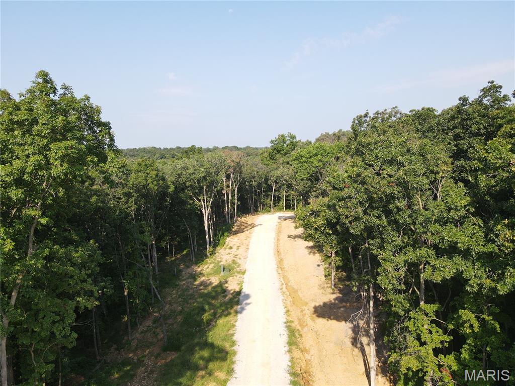 Secluded Wooded Lots at Mark Twain Lake – Your Equestrian Paradise Awaits!
Calling all horse lovers! Own 3 to 10-acre wooded lots just minutes from Mark Twain Lake, nestled near Jellystone Park and Roosters Bar & Grill. These lots offer the perfect private retreat with direct access to over 20 miles of beautiful equestrian trails in Monroe City, Ralls County, Missouri.
Build your dream barn, custom home, or “shouse” and enjoy riding right from your doorstep on miles of scenic, well-maintained trails. Backing up to peaceful, non-hunting Corps land and surrounded by mature hardwoods, you and your horses will experience true tranquility and abundant wildlife.
Utilities including water, electric, and fiber-optic internet are ready to support your lifestyle, and quality roads provide easy access year-round.
Don’t miss this rare opportunity to join the Saddlze Development — the perfect blend of privacy, convenience, and premier riding trails.
Contact us today to saddle up your future! See it. Love it. Own it.