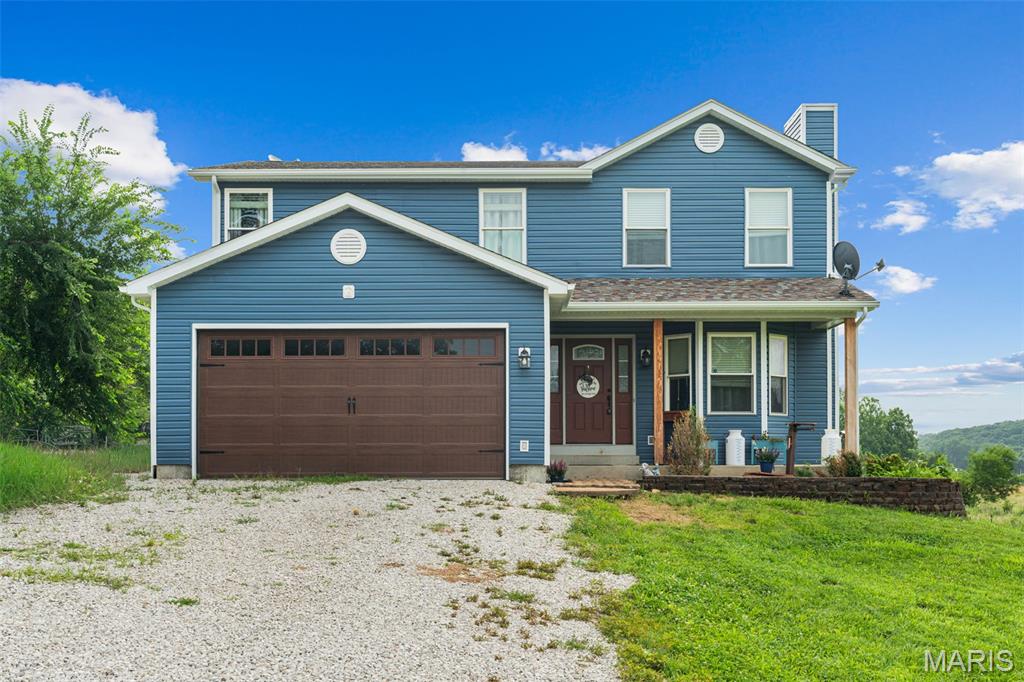 SHOWINGS START MONDAY, JUNE 29TH! Stop scrolling, this one checks all the boxes! Nestled on 6 unrestricted acres, this beautiful two-story home is the perfect setup for your hobby farm, complete with a brand-new barn and plenty of room to enjoy country living. You'll appreciate the extensive updates completed within the last two years, including new siding, roof, HVAC system, garage door, and barn, offering peace of mind for years to come. Inside, the spacious kitchen features abundant cabinet space, stainless steel appliances, a center island, and a pantry. The main-floor laundry room includes additional cabinetry for extra storage. Convenient half bath on the main floor as well! The open living room and dining area is warm and inviting, featuring laminate wood flooring and a pellet stove. Upstairs, you'll find three generously sized bedrooms. The primary suite offers a large walk-in closet and a private en-suite bath with double sinks, a relaxing soaking tub, and a separate walk-in shower. Two additional bedrooms share a well-appointed full hall bathroom. The finished lower level provides even more flexible living space, along with a third full bathroom. Whether you need a family room, home gym, playroom, office, or guest space, the possibilities are endless.
If you've been searching for acreage, modern updates, and room to spread out, this property is a must-see. Schedule your private showing today!
