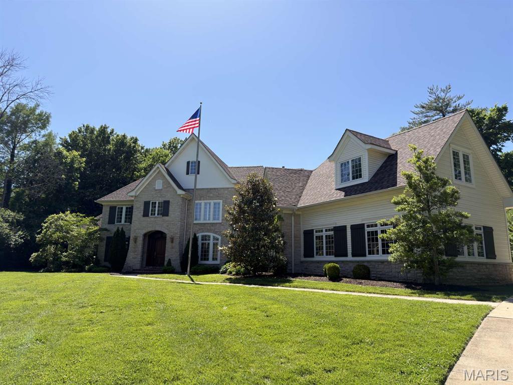 Presenting a rare opportunity to own one of Town & Country’s most distinguished estate homes, ideally situated on a beautifully landscaped 1.01-acre lot along prestigious Town and Country Lane. This exceptional property showcases striking curb appeal with its timeless stone and siding exterior, elegant arched entry, and meticulously maintained grounds.
Offering approximately 9,654 square feet of refined living space, this custom-built French Country residence blends classic architectural design with bright, expansive interiors suited for both everyday living and sophisticated entertaining. Rich hardwood flooring, exquisite millwork, and oversized casement windows create warmth and elegance throughout.
The gourmet kitchen and hearth room feature custom maple cabinetry, stainless steel appliances, dual Bosch ovens, a Sub-Zero refrigerator, two Bosch dishwashers, and a spacious walk-in pantry—designed to meet the needs of both casual meals and formal gatherings. The primary suite continues the custom craftsmanship with beautifully appointed finishes and cabinetry.
Additional highlights include an oversized side-entry four-car garage and a fully private, fenced backyard retreat complete with a Baker pool and expansive terrace—ideal for outdoor entertaining.
The finished lower level offers exceptional versatility, including a billiards room, recreation room with full kitchen, second laundry, exercise room, and workshop space.
Modern conveniences include a security system, irrigation system, indirect lighting, and a whole-house Kohler natural gas generator, ensuring comfort, efficiency, and peace of mind.
This is a truly extraordinary offering in one of Missouri’s most sought-after communities.