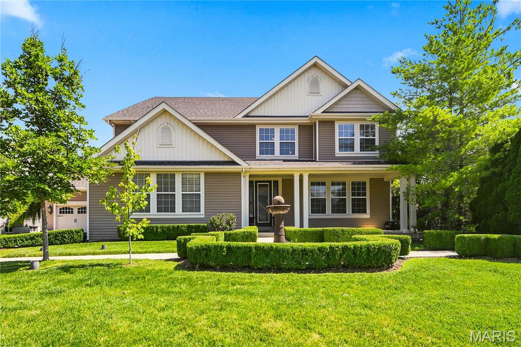 Rare opportunity to own a gorgeous home with a totally custom floor plan in the highly sought after
Hidden Creek 2 subdivision. This home has it all with over 4,000 sq ft of beautifully finished living
space above ground. The wide covered front porch with a custom 8 ft door leads to a gracious foyer
with beautiful crown molding and high profile base trim. The exceptionally large dining room is 17
x13 with sophisticated custom millwork, including extra wide crown molding and wainscoting. The
Great Room measures 32 x 20 with an 11 ft ceiling, beautiful 9 ft windows across the back wall, and
a floor to ceiling fireplace. The house has stunning Elaborate Millwork with Crosshead Accents on
all windows, 8 ft doors on the main level, Grand Casings and High Profile Base Trim. Chef's kitchen
with cherry cabinetry, granite countertops, stainless appliances, a 6' center island and a large
eating area with plenty of room for seating. The primary suite is luxurious with a vaulted 21x19
bedroom, a dressing room with a 3-way dressing mirror, and a 15x12 owners closet. There are two
laundry areas, one of which is on the main floor and a private laundry hook up in the Owner's
retreat. There are 3 more bedrooms and 2 full bathrooms on the second floor. A 20 x13 bonus room
completes the 2nd floor living quarters. Situated on a beautifully landscaped lot with a lovely patio,
& a 4 car garage. Convenient location is minutes from shopping, restaurants & parks located in the
award-winning Francis Howell district.