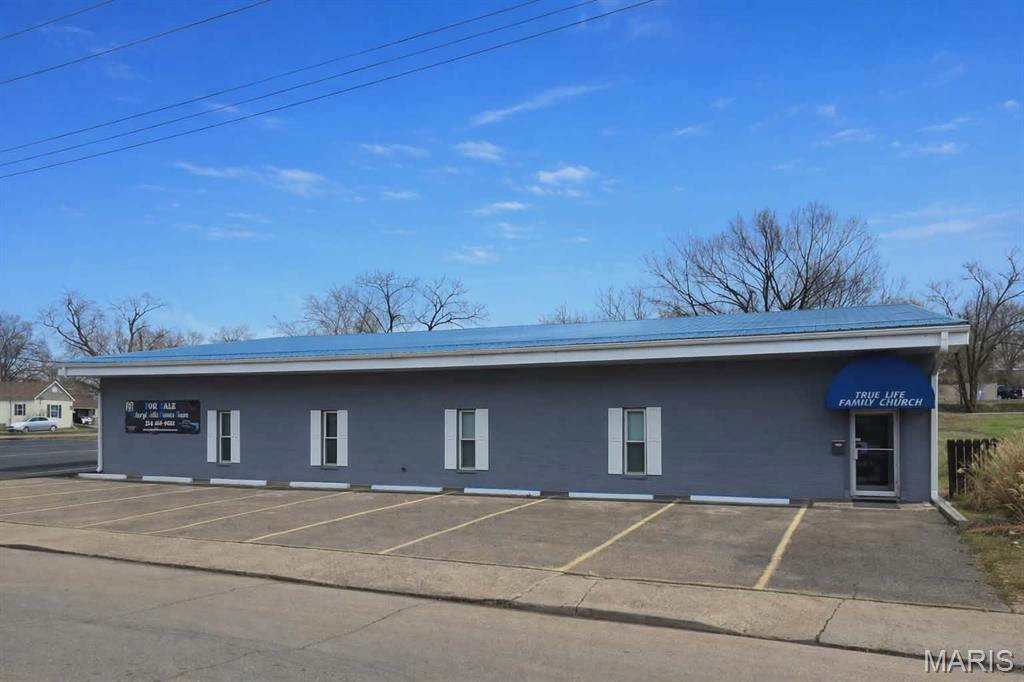 This versatile commercial building has seen extensive renovations and updates within the last two years, making it a fantastic opportunity for a business looking to establish or expand in a move-in-ready space. Approximately 90% of the building has been updated, including new drywall, insulation, and professional paint throughout, creating a clean and modern feel.
Recent improvements include new kitchen cabinets and flooring, new carpet in the auditorium area, and new vinyl flooring in the hallways and bathrooms. The spacious kitchen and dining area is ideal for gatherings, events, or employee use and features a stove, refrigerator, and a large island, all installed in late 2024.
Additional upgrades include a new sump pump with battery backup installed in 2024, providing added peace of mind. The parking lot was sealed and striped in 2024, and the building is equipped with security lighting along the rear parking lot side as well as an alarm system with all doors wired for security.
The property currently includes three additional rooms already set up as potential offices, with plenty of room to create more offices, meeting rooms, or flexible workspaces if desired. With its large auditorium space and flexible layout, this property offers endless possibilities for a variety of business uses.
A great opportunity to launch, relocate, or grow your business in a thoughtfully updated building ready for its next chapter. Price has been reduced, presenting an exceptional value for the buyer.
