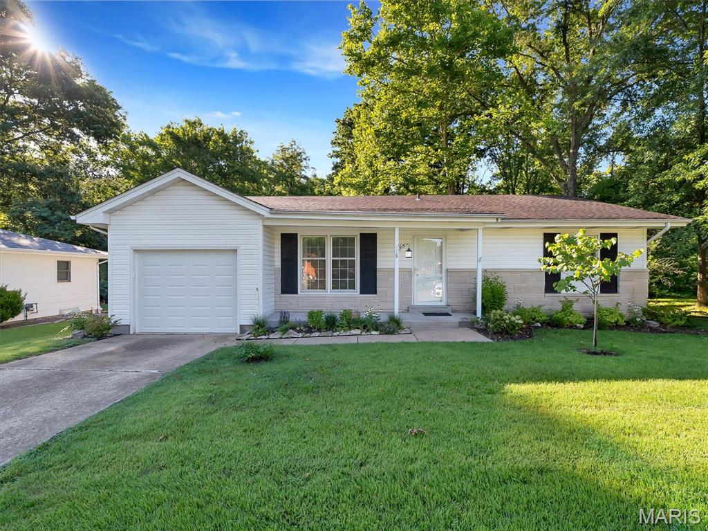 Welcome home to this charming, move-in ready ranch tucked away near the end of a quiet street in one of Washington's established neighborhoods. Situated on a level lot that backs to a peaceful, tree-lined creek, this property offers a private backyard where you can relax in the shade while enjoying abundant wildlife and the beauty of nature. With plenty of space for additional landscaping or a garden, it's easy to imagine making this your own personal retreat. The current owners originally planned to make this their forever home and invested in thoughtful, timeless updates throughout the past year before an unexpected move changed their plans. Their loss is your opportunity to enjoy a home that's been lovingly improved and is ready for its next chapter. Recent updates include new furnace & AC, garage door, fresh interior paint, new landscaping, smooth-finished ceilings, drywall finishing in the garage, new carpeting in the living room, stylish new wallpaper, an updated primary shower, some interior doors & fixtures, and a full suite of stainless steel kitchen appliances, including a built-in oven/microwave combination, dishwasher, and refrigerator. Cute as can be and truly move-in ready, this home combines comfort, privacy, and tasteful updates in a location that's convenient to everything Washington has to offer. Whether you're looking for your first home, downsizing, or simply searching for a peaceful place to call your own, this charming ranch is ready to welcome you home. Seller has elected to market and sell the property in its current condition. Seller will consider offers contingent upon inspections; however, the property is being sold AS IS, and the seller will not make repairs, provide repair credits, or negotiate based on inspection findings. Buyers are encouraged to conduct any inspections they deem appropriate for informational purposes prior to closing.
