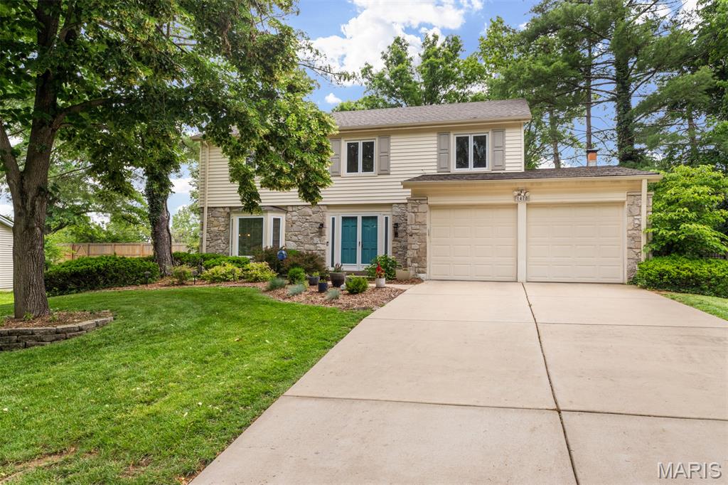 Welcome to 1478 Cherry Creek Lane, located in the highly sought-after Parkway South School District. This beautiful home offers outstanding curb appeal with its attractive stone-front accent, lush landscaping, and a private backyard designed for low-maintenance enjoyment. As you enter, you’re greeted by a spacious formal living room and elegant formal dining room, perfect for entertaining. The updated kitchen is truly second to none, featuring gorgeous cabinetry, beautiful countertops, and an open layout that flows seamlessly into the cozy family room with a wood-burning fireplace. One of the standout features of this home is the private deck overlooking the beautifully landscaped backyard retreat. Plus, unlike many homes in the neighborhood, this property offers the convenience of a main-floor laundry room. Upstairs, you’ll find four generously sized bedrooms and two full bathrooms, including a spacious primary suite with a walk-in closet and private bath. The second full bath comfortably services the additional three bedrooms. The finished lower level provides even more living space with an additional family room, while the two-car garage completes this fantastic home. Don’t miss your opportunity to own this wonderful home in an incredible location within the Parkway South School District. Tons of updates including Kitchen, deck ,HVAC and water heater and roof!! WOWZER!!! Subdivision Pool!!!