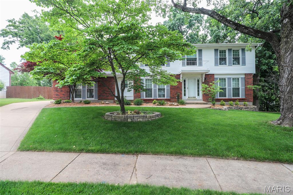 Wonderful 2-story on a cul-de-sac with 4 bedrooms and 3 and one-half baths in South County. 2-car rear-entry garage, and it is oversized. Park-like yard with lower-level patio. This one has a finished basement and a full bath downstairs with a wet bar.  Upstairs has 2 walk-in closets, 4 bedrooms, and 2 full baths. The main floor has a breakfast room, a laundry room, a separate dining room, a living room, and a family room with a fireplace.