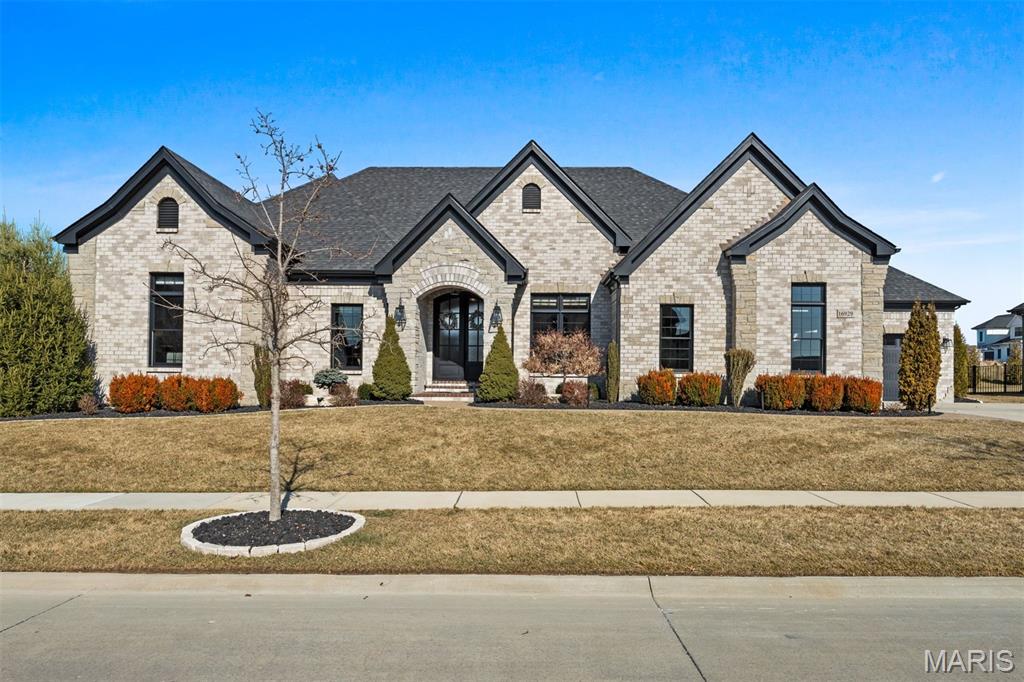An unbelievable five year young ranch in the highly sought after Fienup Farms subdivision, one of Chesterfield’s most desirable communities offering pickleball courts, playgrounds, walking trails, and a picturesque lake. This home can be described in one word: perfection. Every detail has been thoughtfully contemplated, creating an atmosphere that feels calm, refined, and almost spa like from the moment you enter.  Outdoors, the backyard is straight from a magazine, designed for both relaxation and entertaining with a covered patio, spectacular pool with lounging beach and waterfall, outdoor kitchen, firepit area, and a dedicated hot tub retreat. All of this is set within a lush, beautifully landscaped fenced yard with additional green space for play and gatherings. Four car garage. Properties of this caliber rarely come to market.