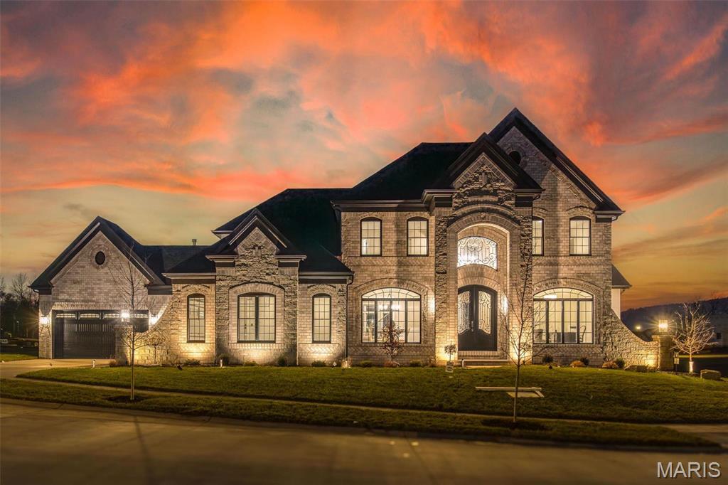 New Construction (HOME TO BE BUILT)! MAGNIFICENT 1.5 Story home w/ Finished Lower Level in a FABULOUS LOCATION! Crafted by St. Louis' premier hands-on builder, Claymont Development, LLC - Wesley Byrne. The WINGATE III is a spectacular 5BR, 4.5bath w/ 5200 sqft of exquisitely finished living space. Exterior features a warm blend of brick & stone; extensive millwork; The two-story entry foyer makes a striking first impression! Formal dining room w/ wainscoting & office on either side of the Foyer; two-story great room w/ gas fireplace, built-in shelving. Gourmet kitchen features custom cabs, granite counters & 9-ft island! Luxury owner’s suite w/ dual closets. Three bedrooms, two baths, & bonus room complete the upper level. 10' main floor ceiling, 8' doors, 4-car garage! Sensational LL includes brick/stone wet bar, huge rec-room, 5th bed & full bath. Pictures & Tour are of the Display Home