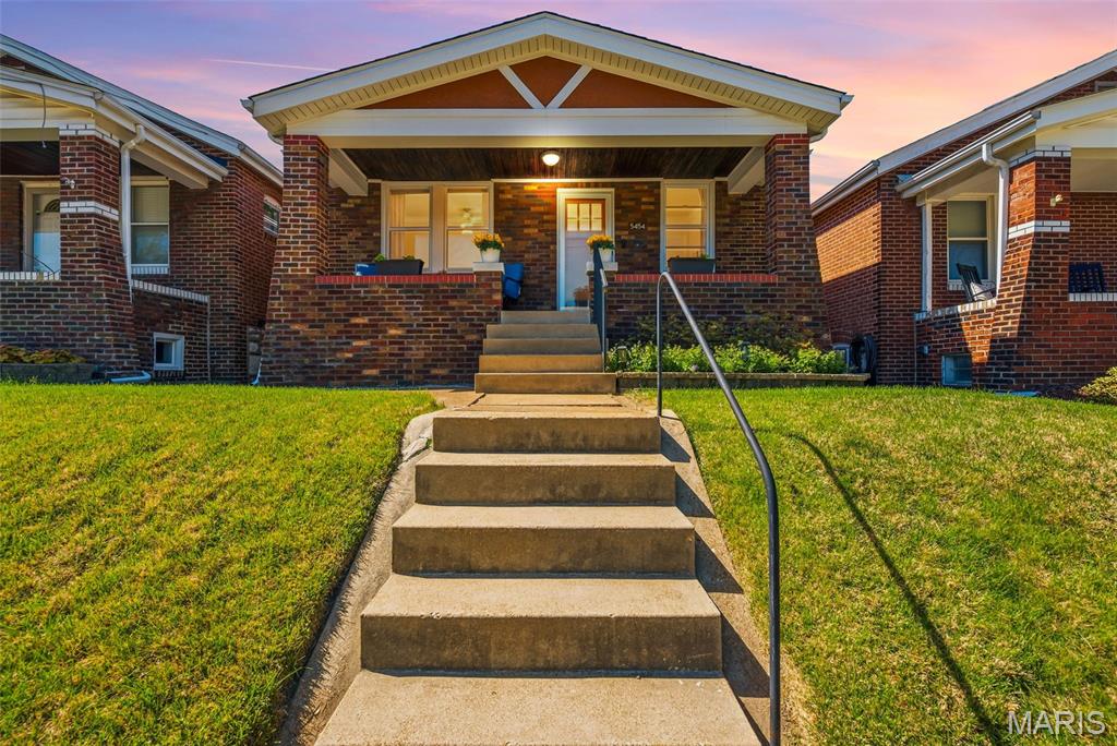 **OPEN HOUSE MAY 17TH 11AM - 1PM**

Fall in love with this renovated home, perfectly blending timeless old-world charm with today’s modern updates. This beautiful 2-bedroom, 1-bath home features gleaming hardwood floors, original woodwork in exceptional condition.  Original stained-glass windows and vintage hardware were thoughtfully preserved to maintain the home’s historic character.
The custom kitchen is a true showstopper with granite countertops, white shaker cabinetry, ceramic tile flooring, and smudge-proof stainless steel appliances. The updated bathroom features ceramic tile surround, a new vanity, and updated fixtures.  Additional updates include newer windows throughout, a new roof installed in 2025, a new hot water heater in 2024, updated plumbing with a new stack, and an upgraded electrical panel-providing peace of mind for years to come. Other recent improvements include a garage door opener installed in 2016, new soffit and fascia in 2017, fresh interior paint in 2023, a new back door in 2024, and a repaired back porch featuring low-maintenance composite decking completed in 2025.   The partially finished lower level offers flexible space perfect for a home office, media room, game room, or playroom, while the remaining basement area is exceptionally clean and ideal for storage.  There is 1 car garage in the back with alley access.  Home has passed city occupancy inspection.  Welcome home!
